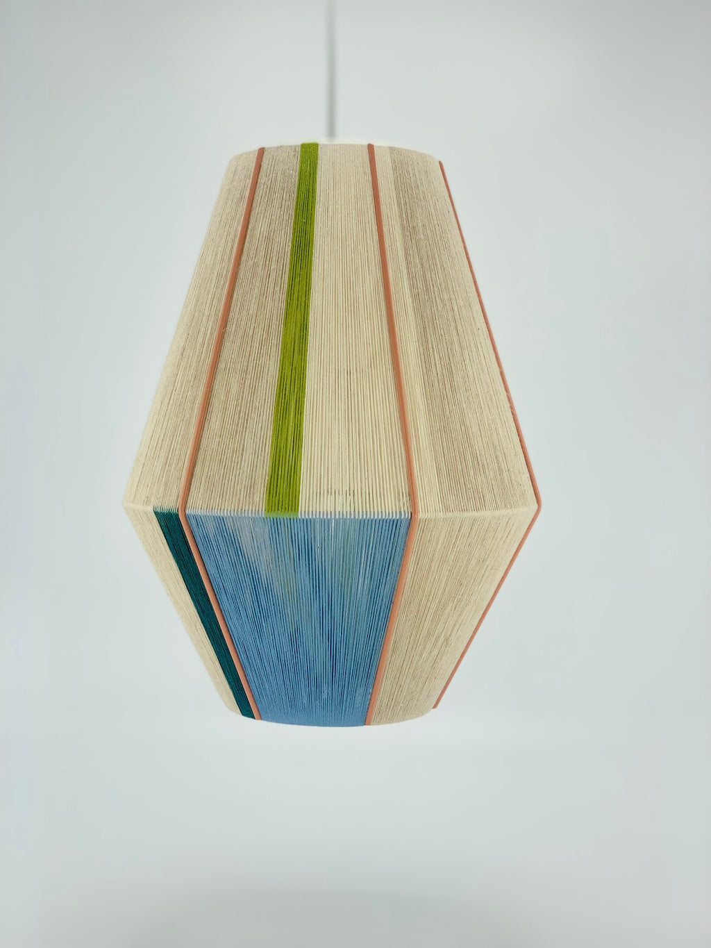 Alice Baya pendant light in blue, green, lime and natural yarns by Skye Lightly.