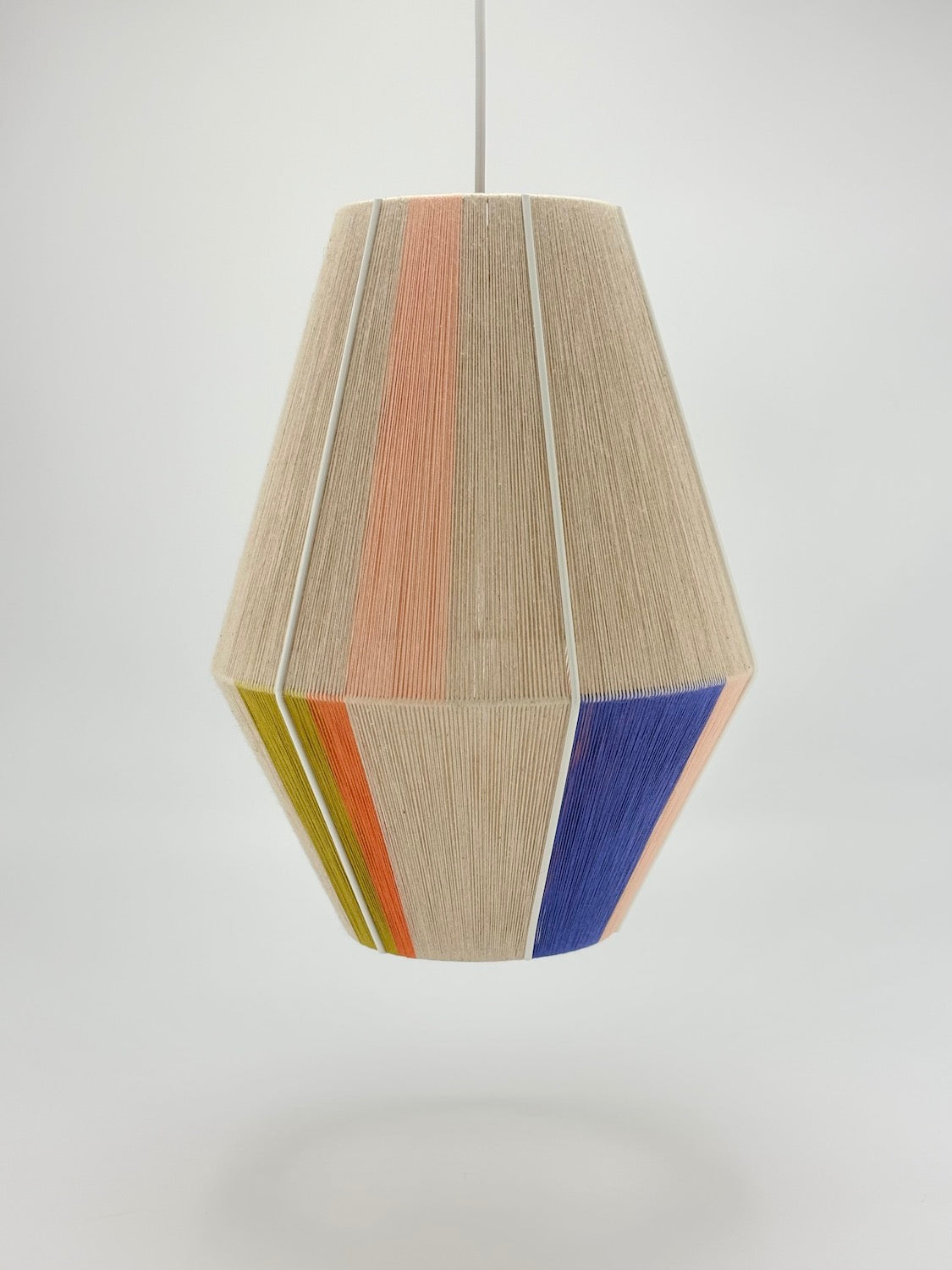 centre view of Parker Baya pendant light handwoven in mustard, orange, peach and periwinkle yarns by Skye Lightly