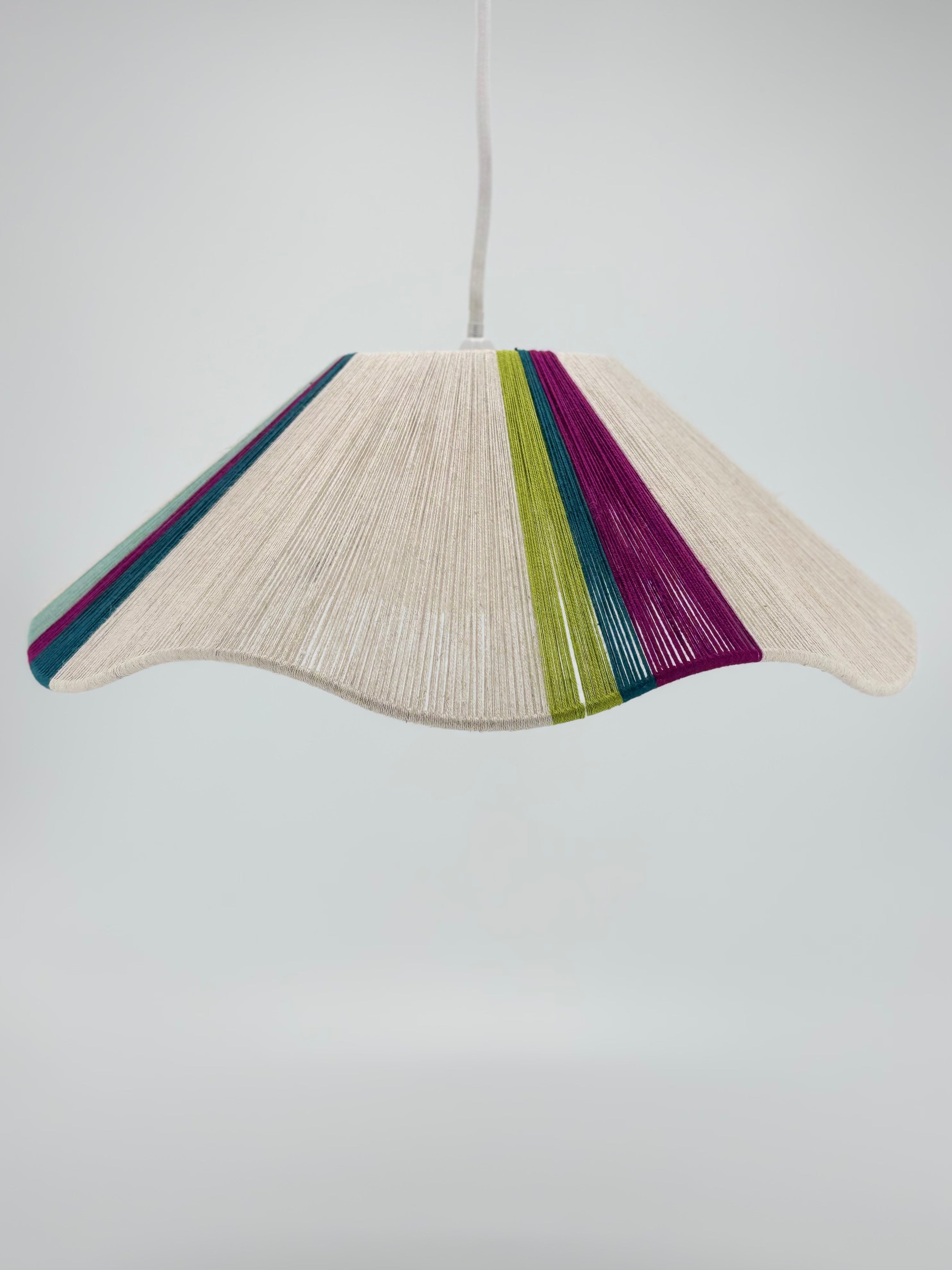 Sono Wave pendant light handwoven in lime, magenta, teal, turquoise and natural yarns by Skye Lightly