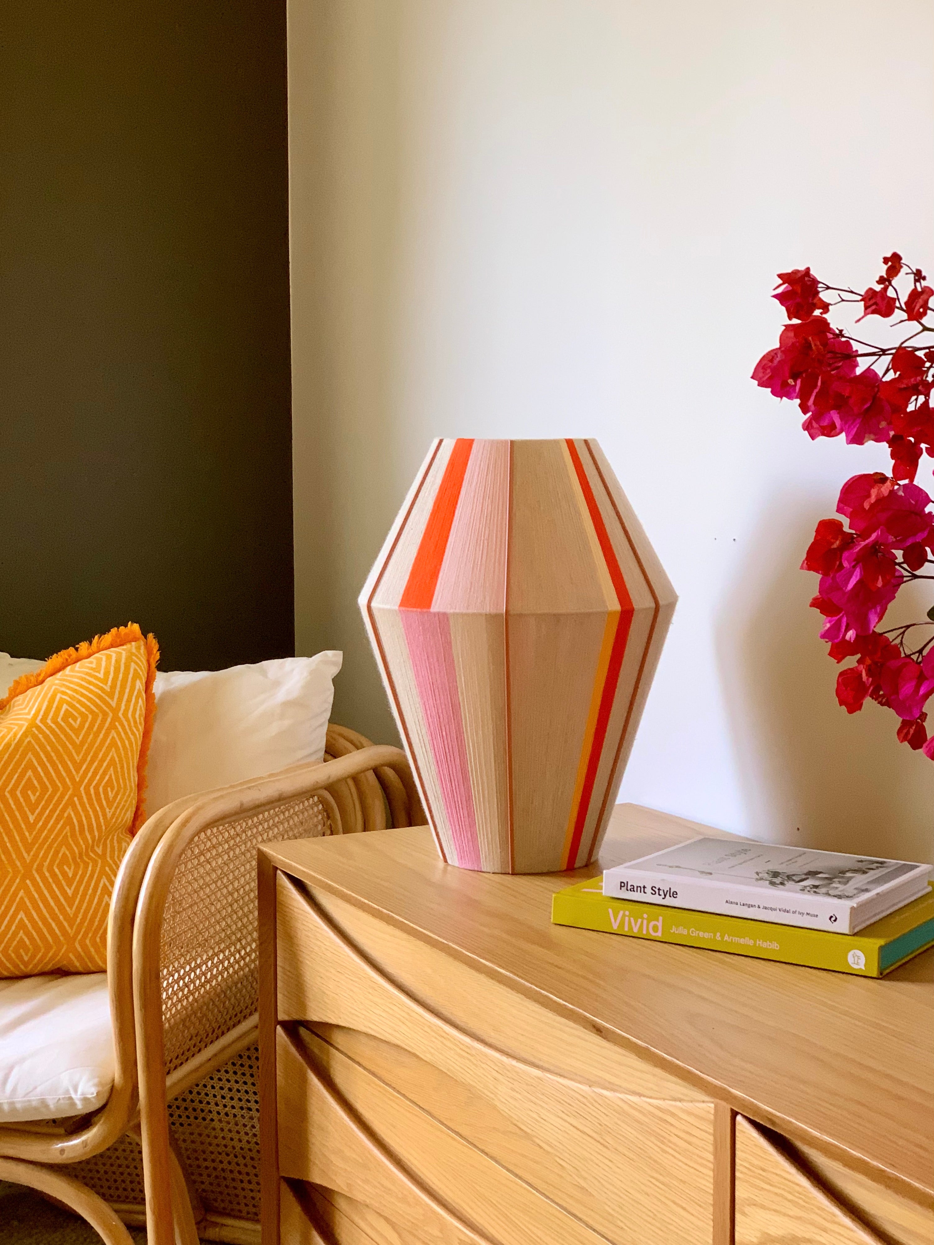 Valentina handwoven pendant light in coral, mustard, and eucalyptus yarns by Skye Lightly