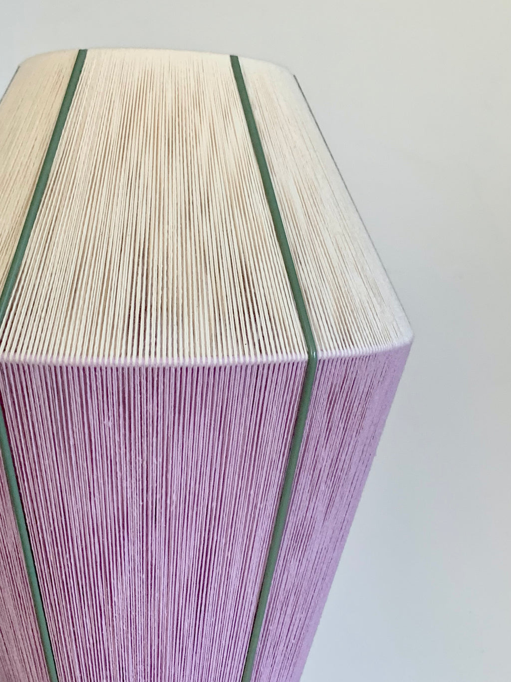 close view Hey Day Baya pendant light handwoven in lilac and eucalyptus yarns by Skye Lightly
