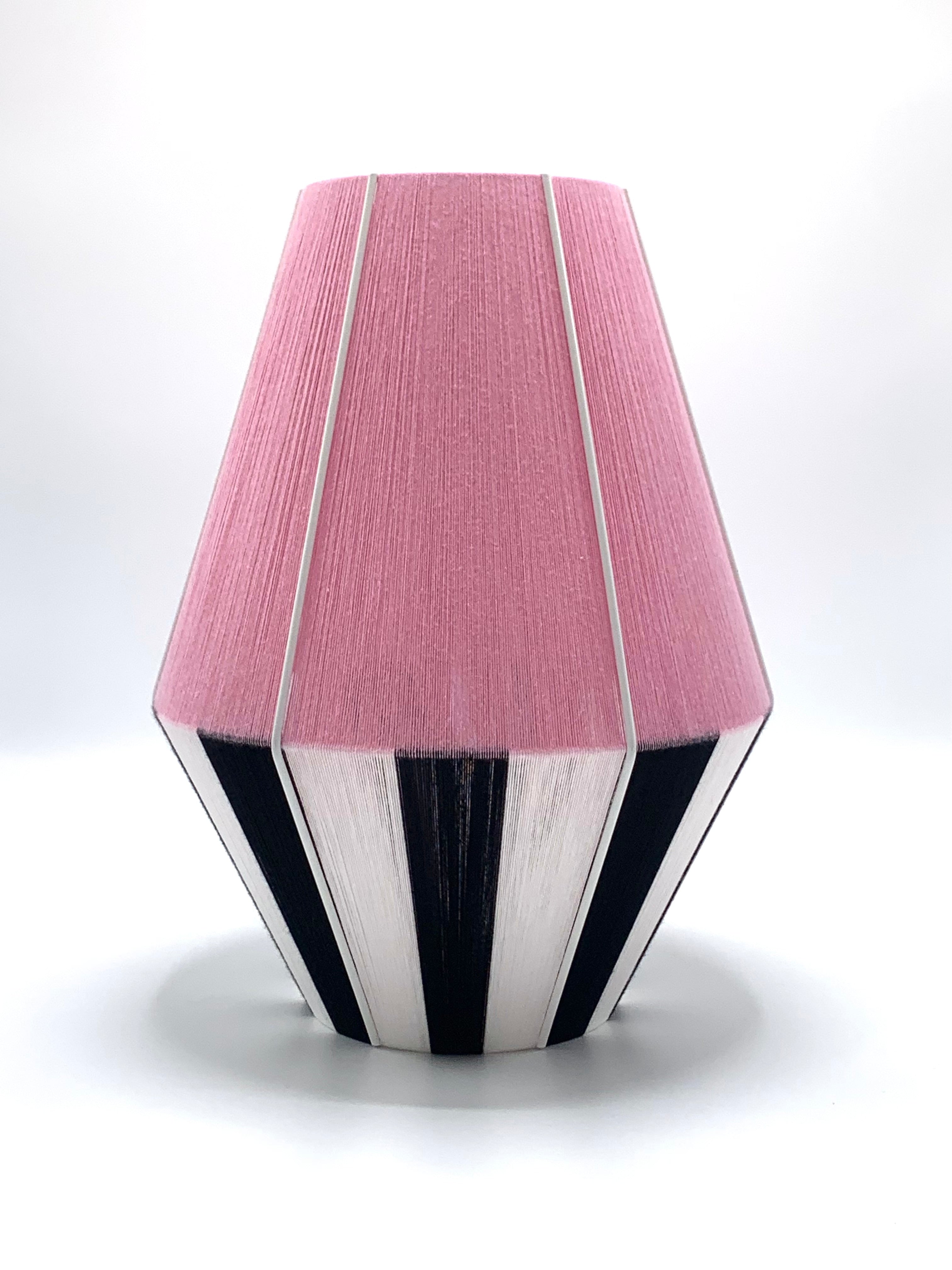 photoshoot of Liquorice Allsorts Baya shade handwoven in black, white and rose yarns by Skye Lightly