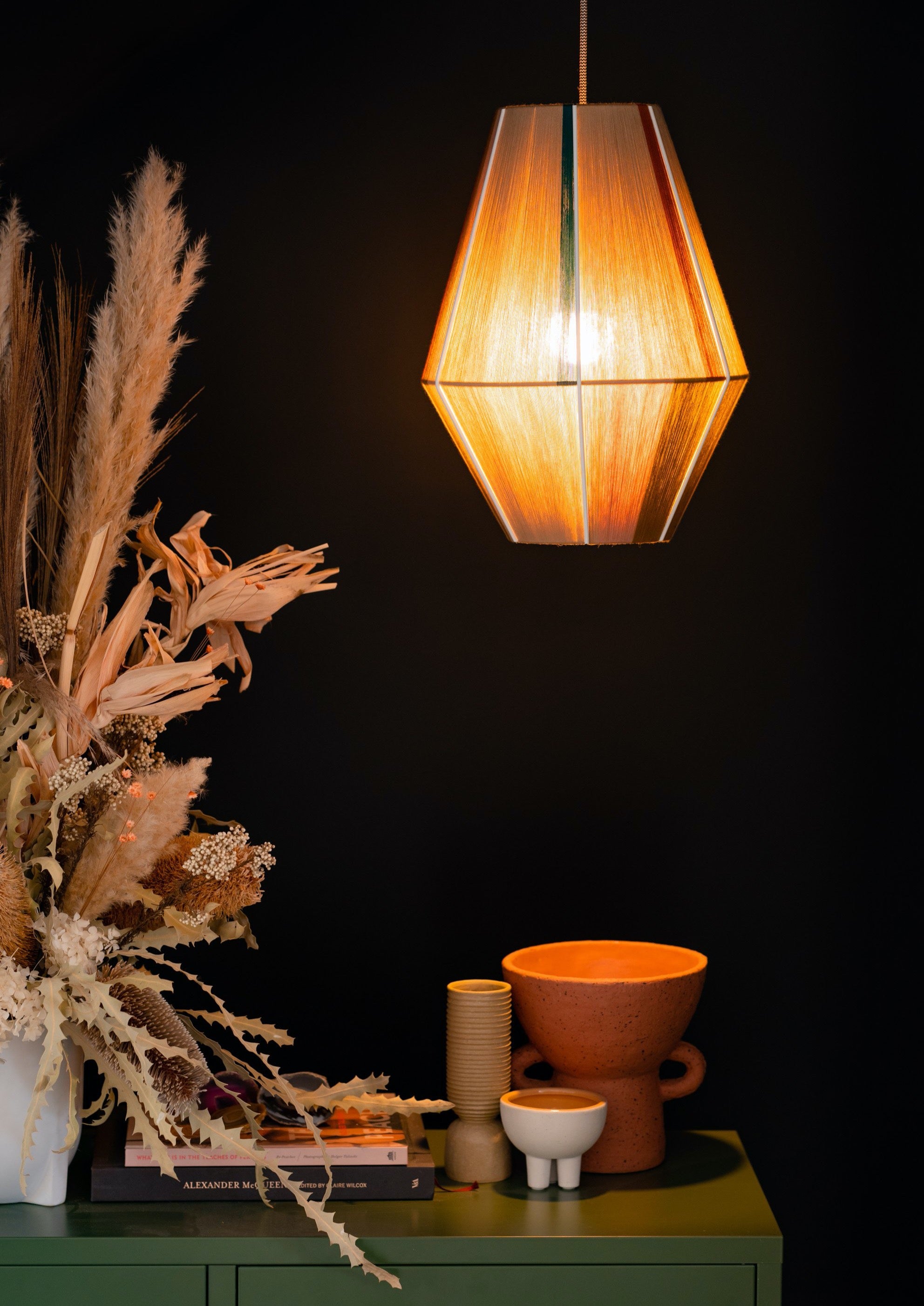 Casey Baya pendant light handwoven in periwinkle, blush, coral and natural yarns by Skye Lightly
