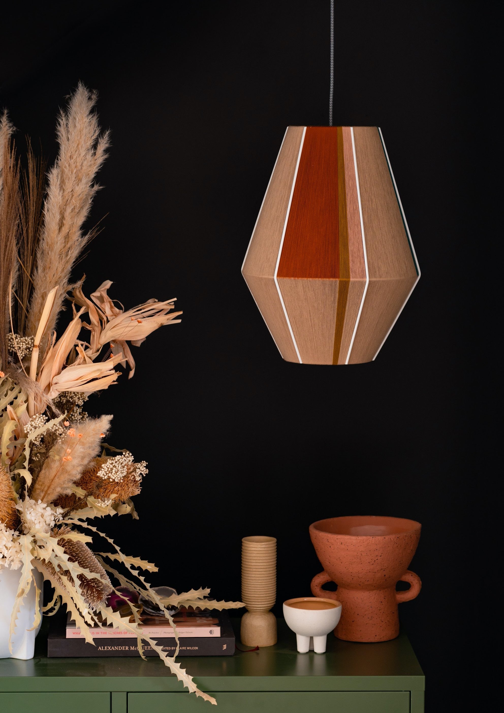 Casey Baya pendant light handwoven in periwinkle, blush, coral and natural yarns by Skye Lightly

