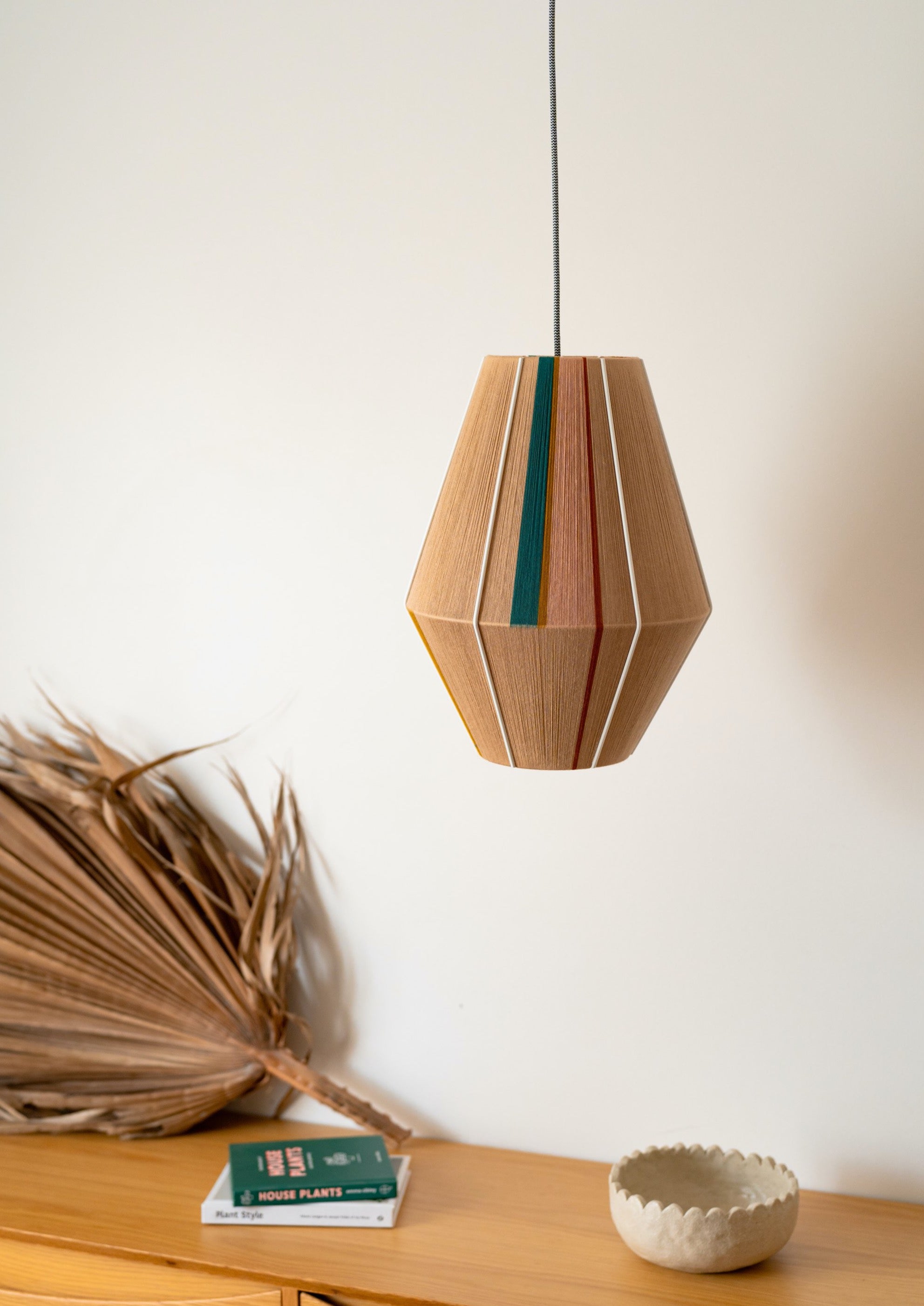 Casey Baya pendant light handwoven in periwinkle, blush, coral and natural yarns by Skye Lightly
