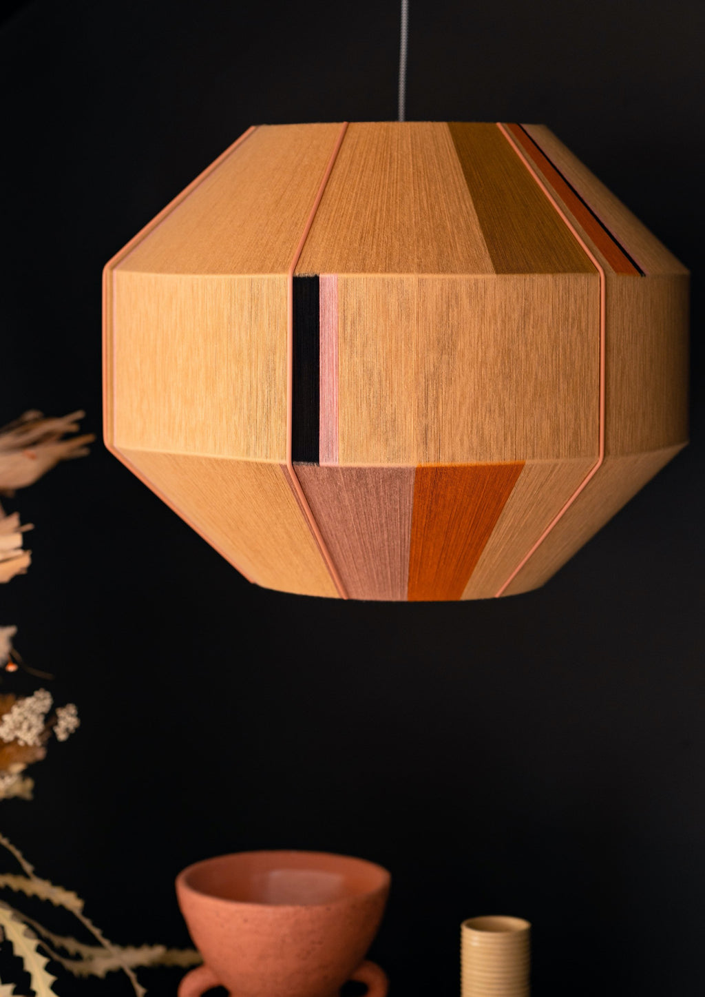 Charlotte Hive pendant light handwoven in sage, peach, periwinkle and natural yarns by Skye Lightly
