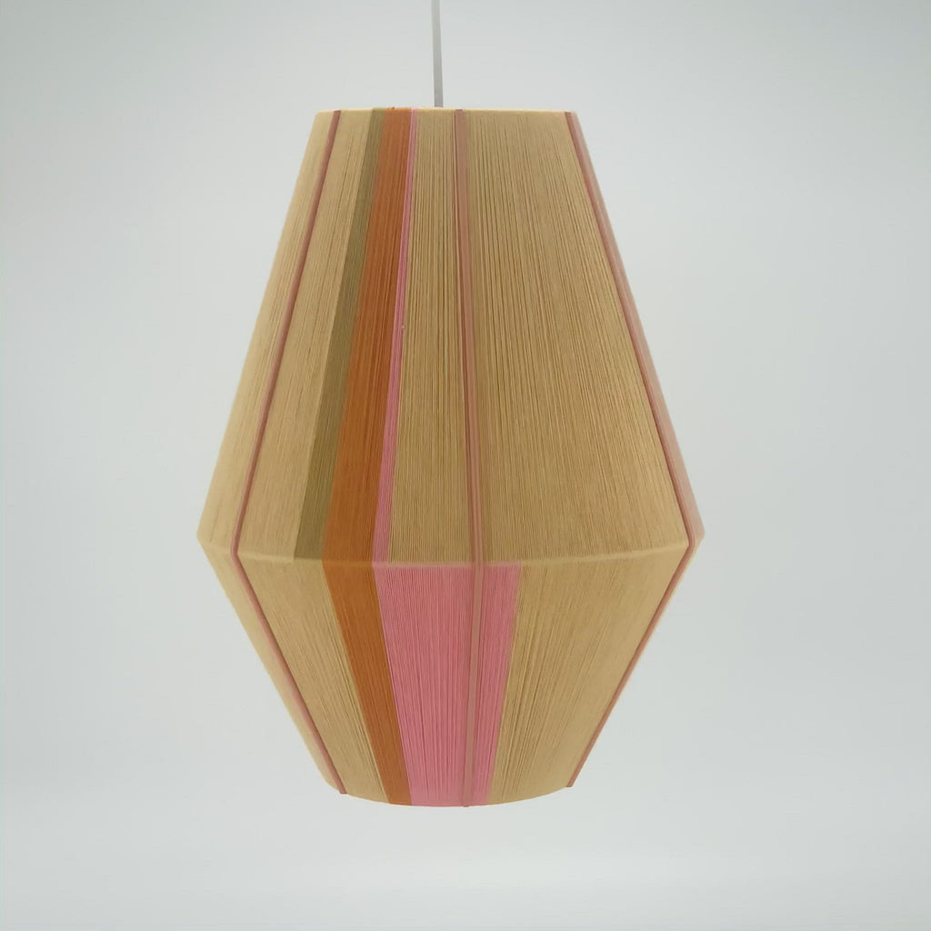 Keaton Baya pendant light handwoven in navy, mustard, coral and natural yarns by Skye Lightly
