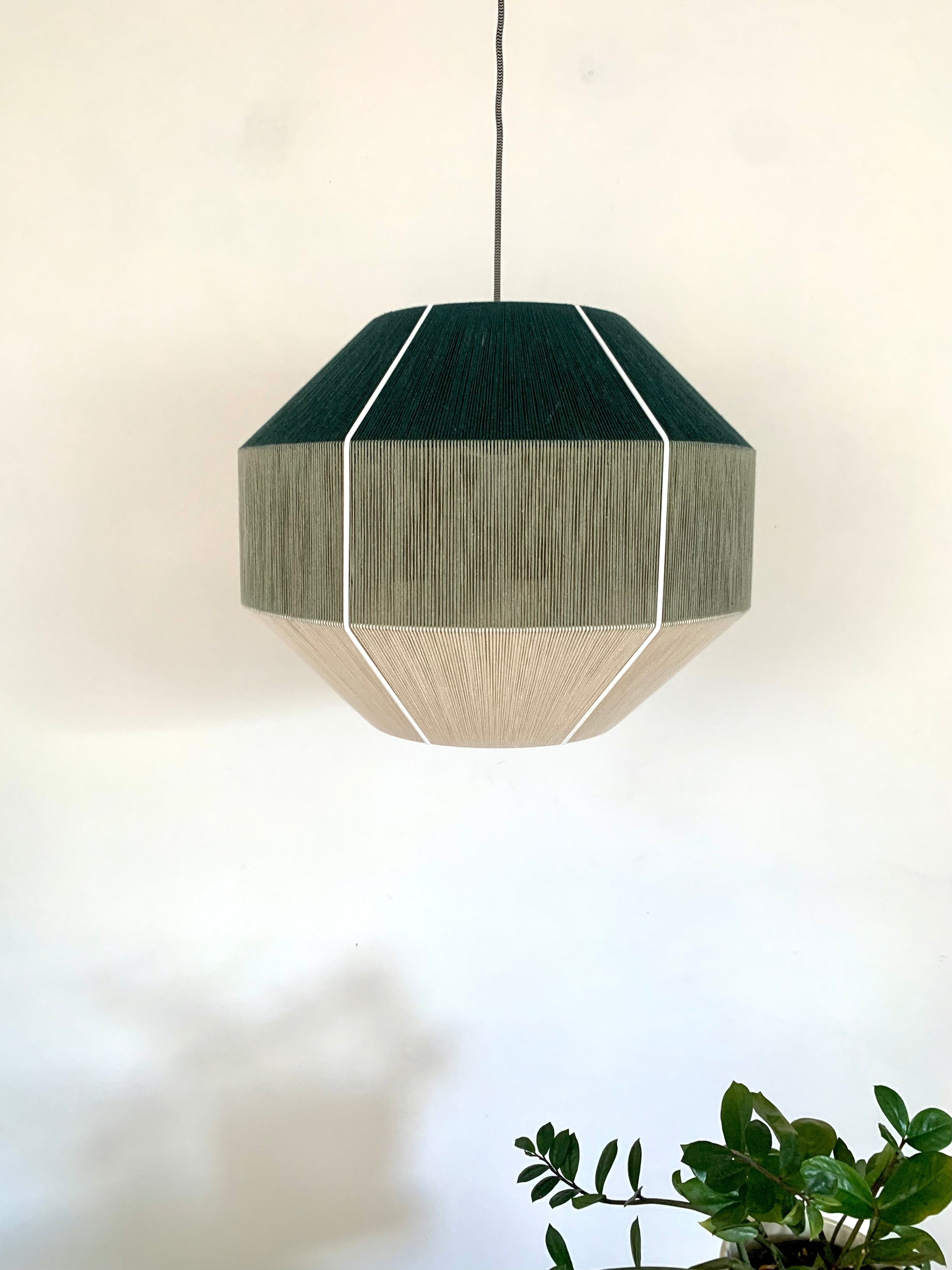 Centre of Hive pendant light handwoven in Kentucky green and sage yarns by Skye Lightly