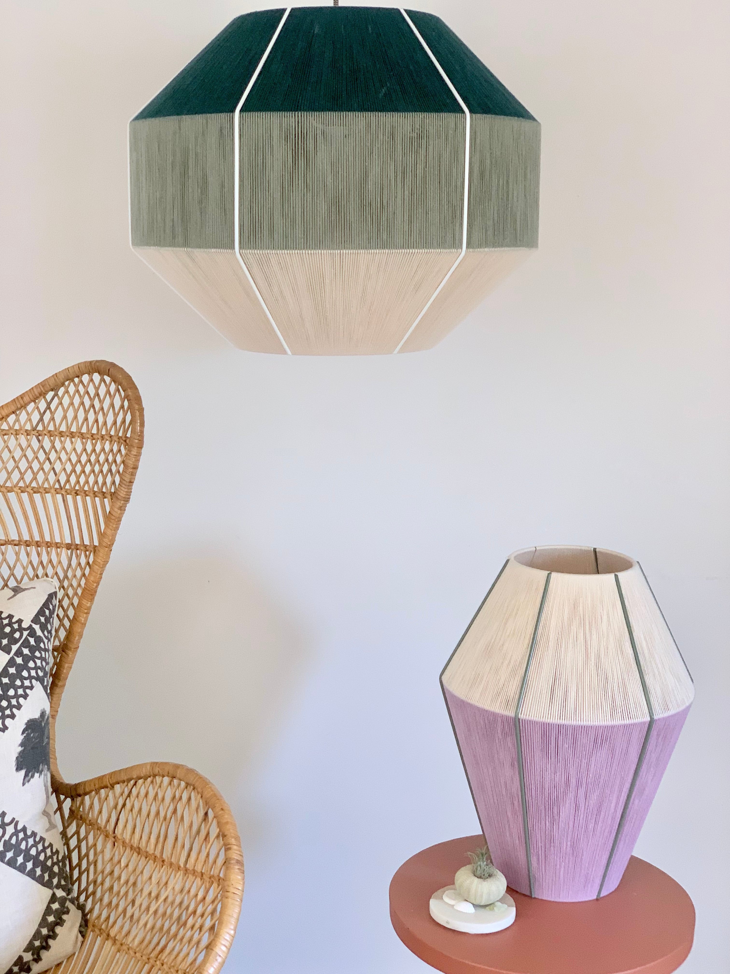 Collection shot viewing Hive pendant light handwoven in Kentucky green and sage yarns by Skye Lightly