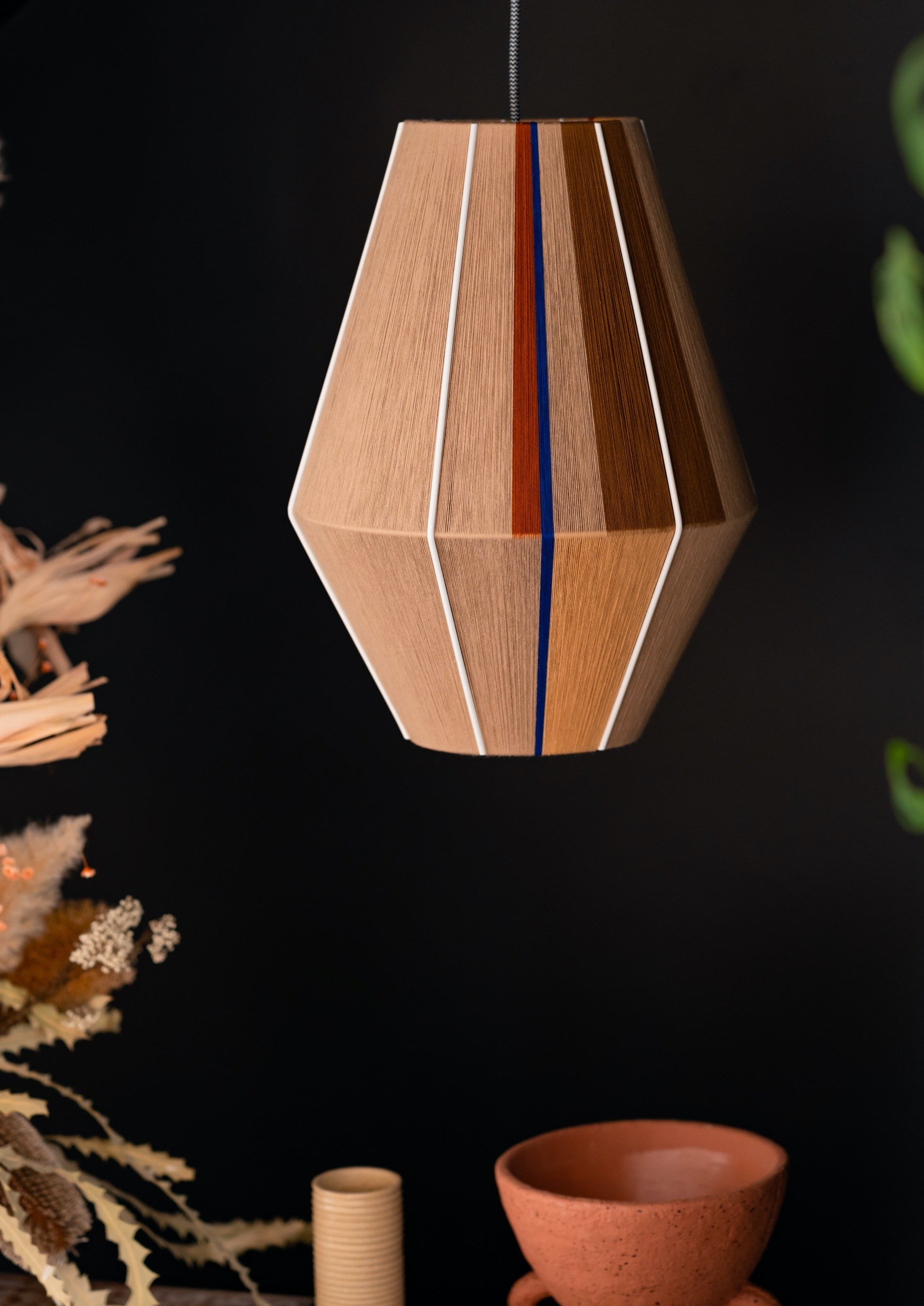 Julia Baya pendant light handwoven in rose, teal, apricot and natural yarns by Skye Lightly
