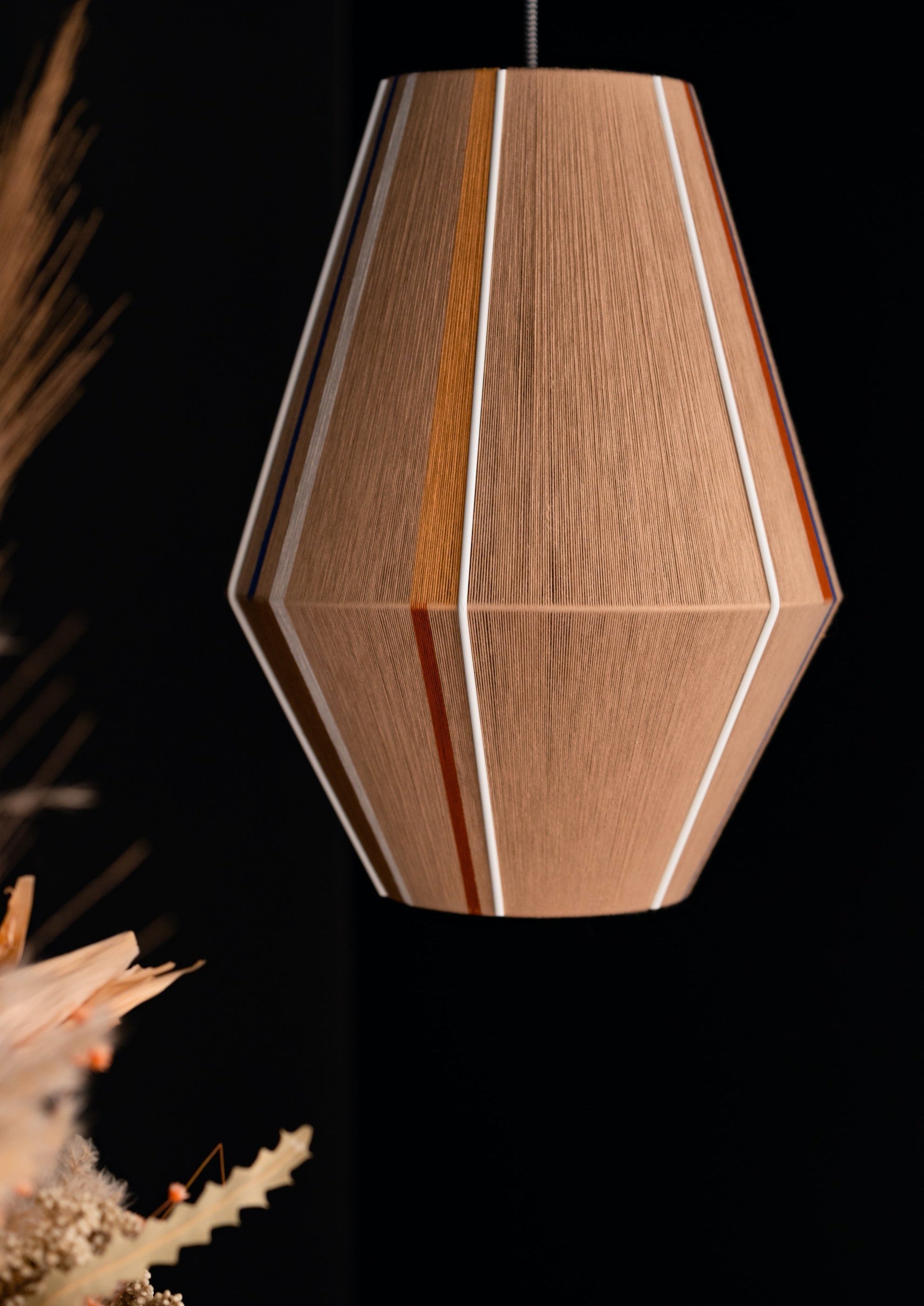 Julia Baya pendant light handwoven in rose, teal, apricot and natural yarns by Skye Lightly
