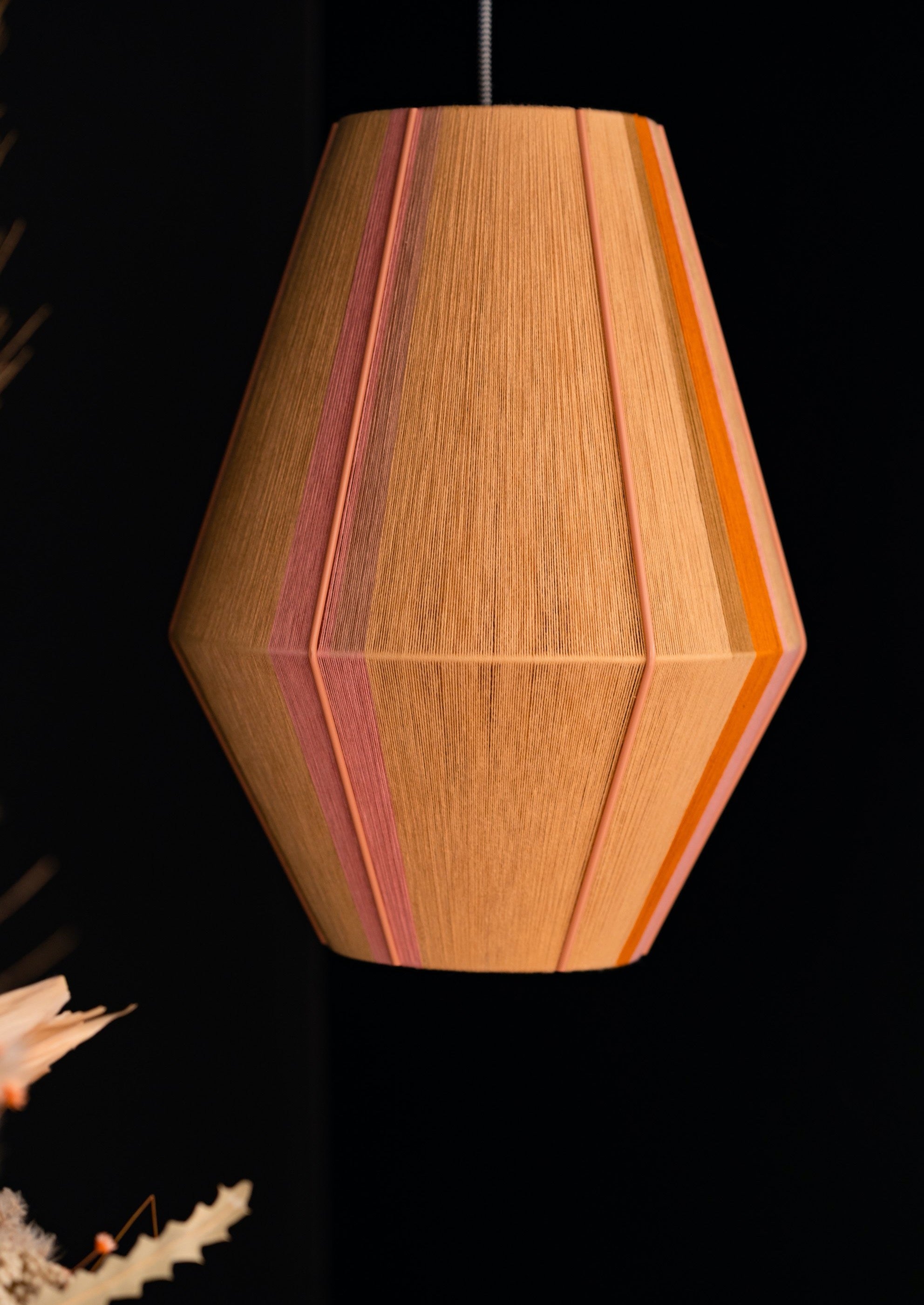 Keaton Baya pendant light handwoven in navy, mustard, coral and natural yarns by Skye Lightly
