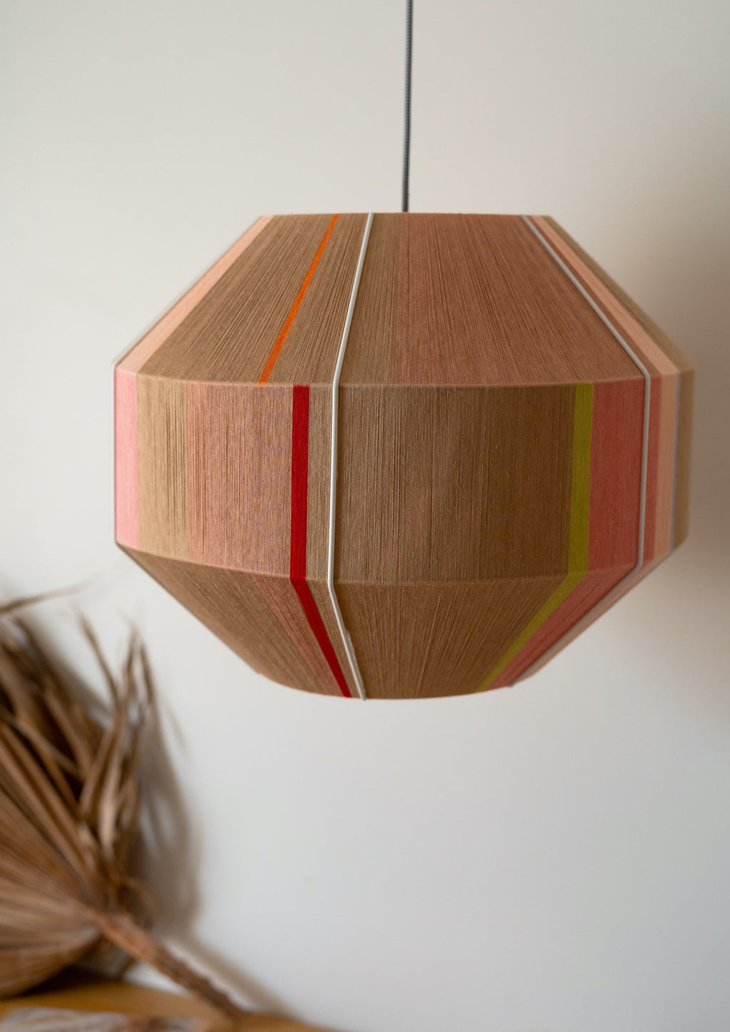 Laura Hive pendant light handwoven in blush, lilac, mustard and natural yarns by Skye Lightly
