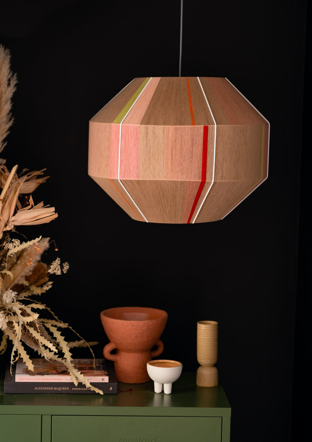 Laura Hive pendant light handwoven in blush, lilac, mustard and natural yarns by Skye Lightly

