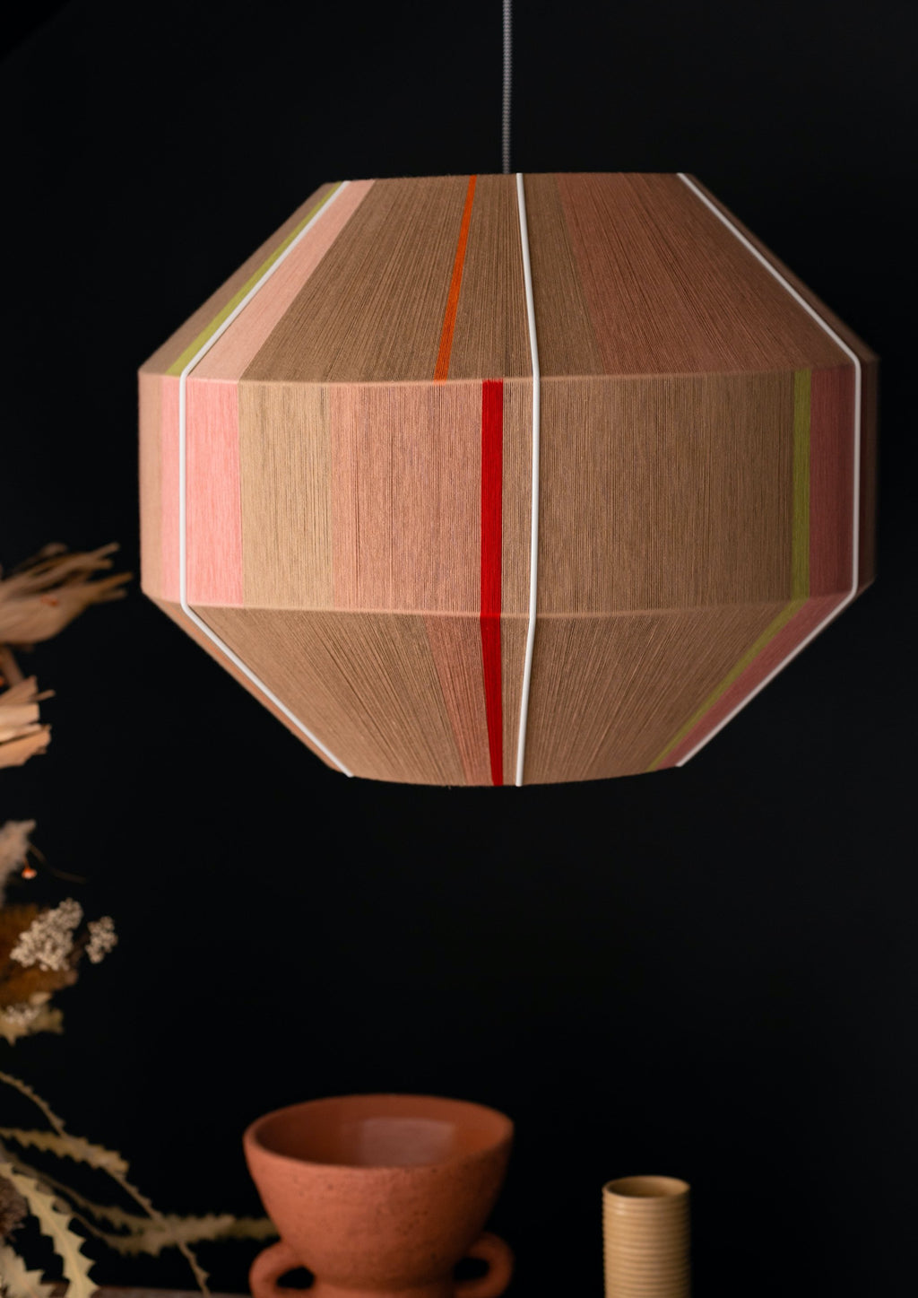 Laura Hive pendant light handwoven in blush, lilac, mustard and natural yarns by Skye Lightly
