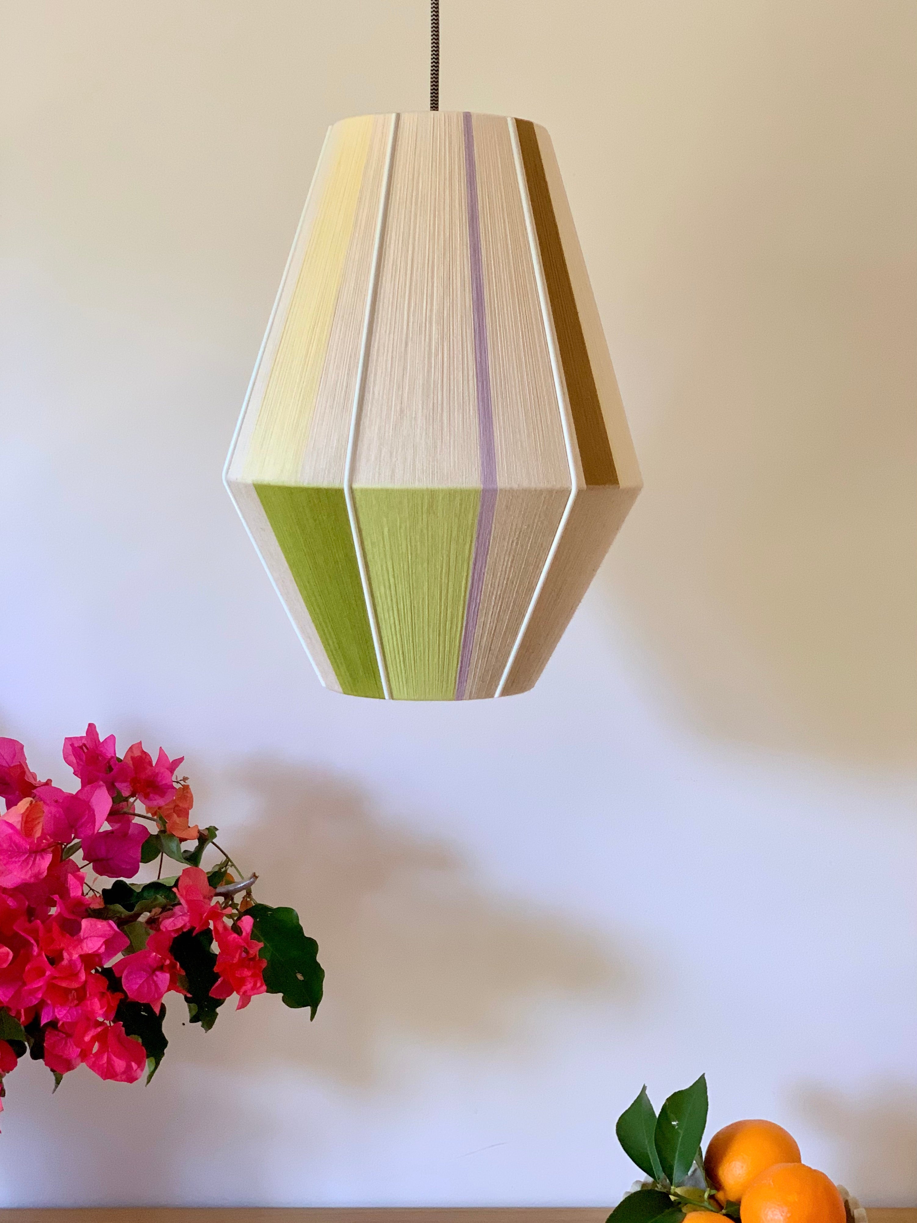 centre shot of Lou Lou Baya pendant light handwoven in teal, peach, lavender, and natural yarns by Skye Lightly