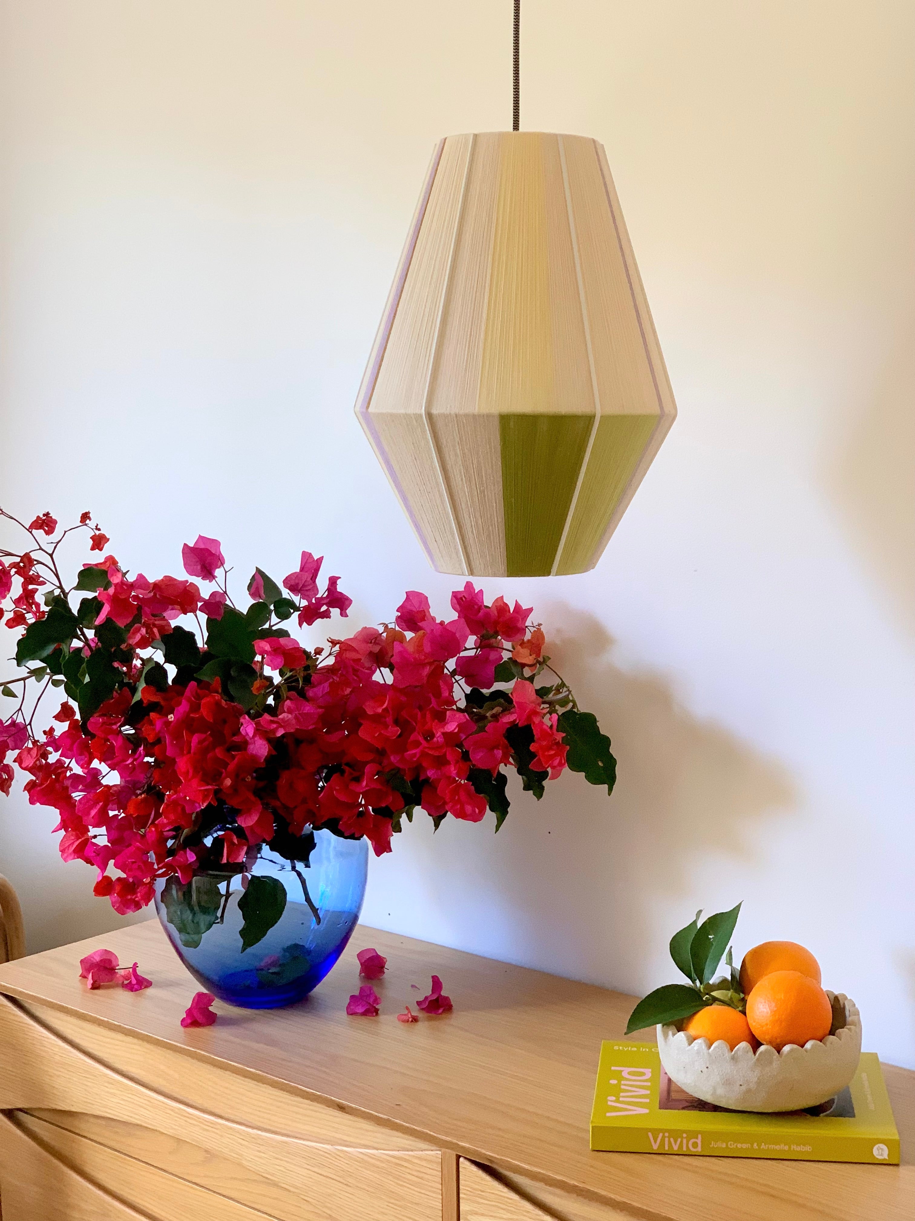 image of Lou Lou Baya pendant light handwoven in teal, peach, lavender, and natural yarns by Skye Lightly