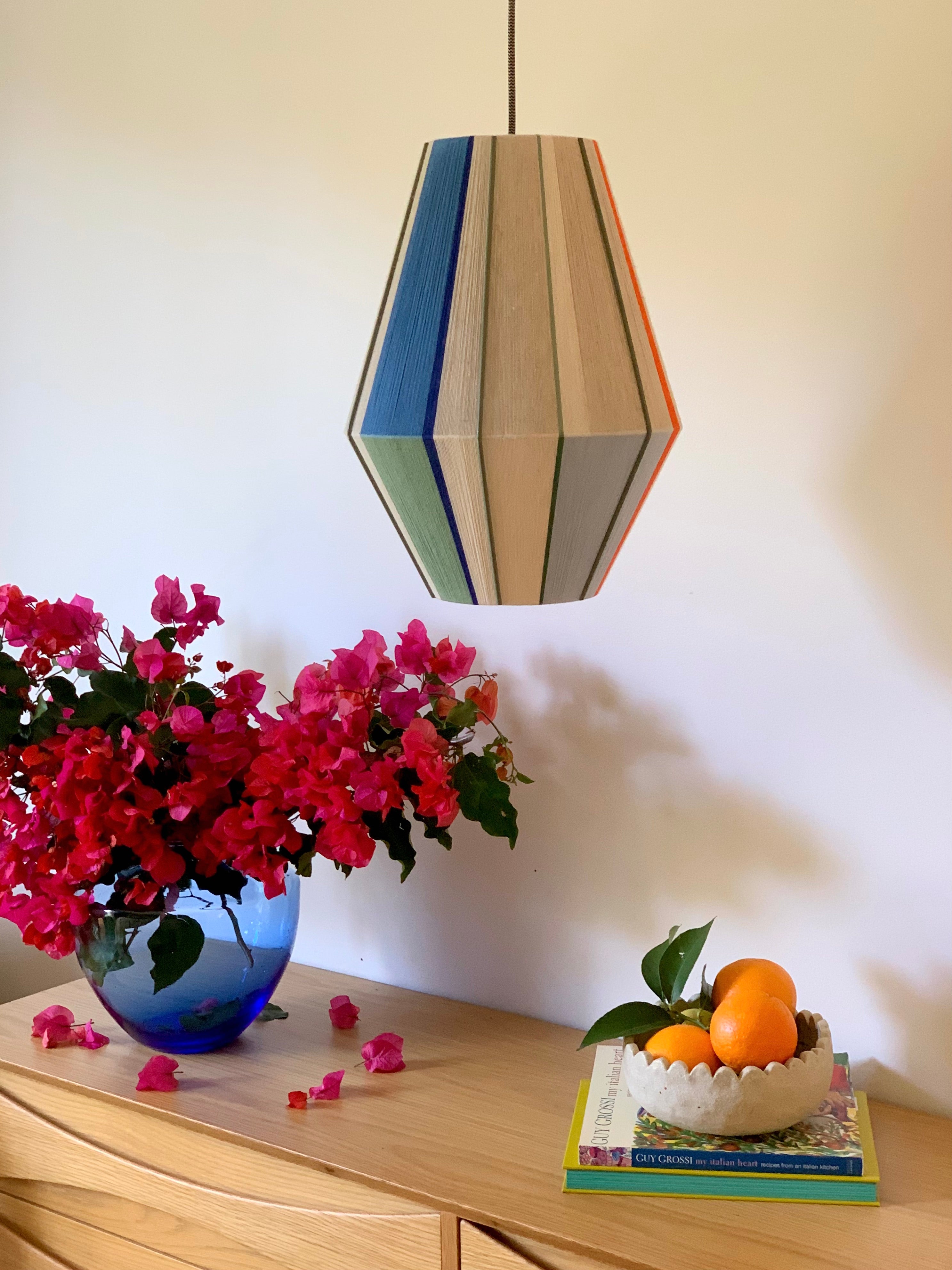 Luca Baya pendant light handwoven in navy, mustard, lilac, and natural yarns by Skye Lightly 1