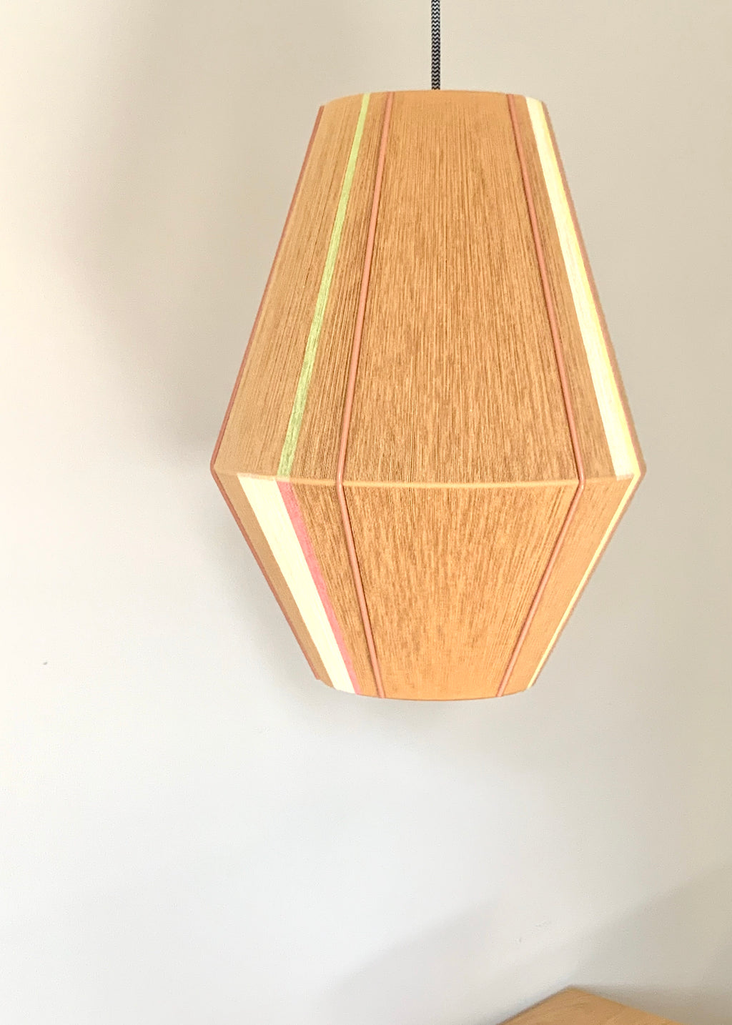 Lucy Baya pendant light handwoven in soft pink, lavender, mint and natural yarns by Skye Lightly
