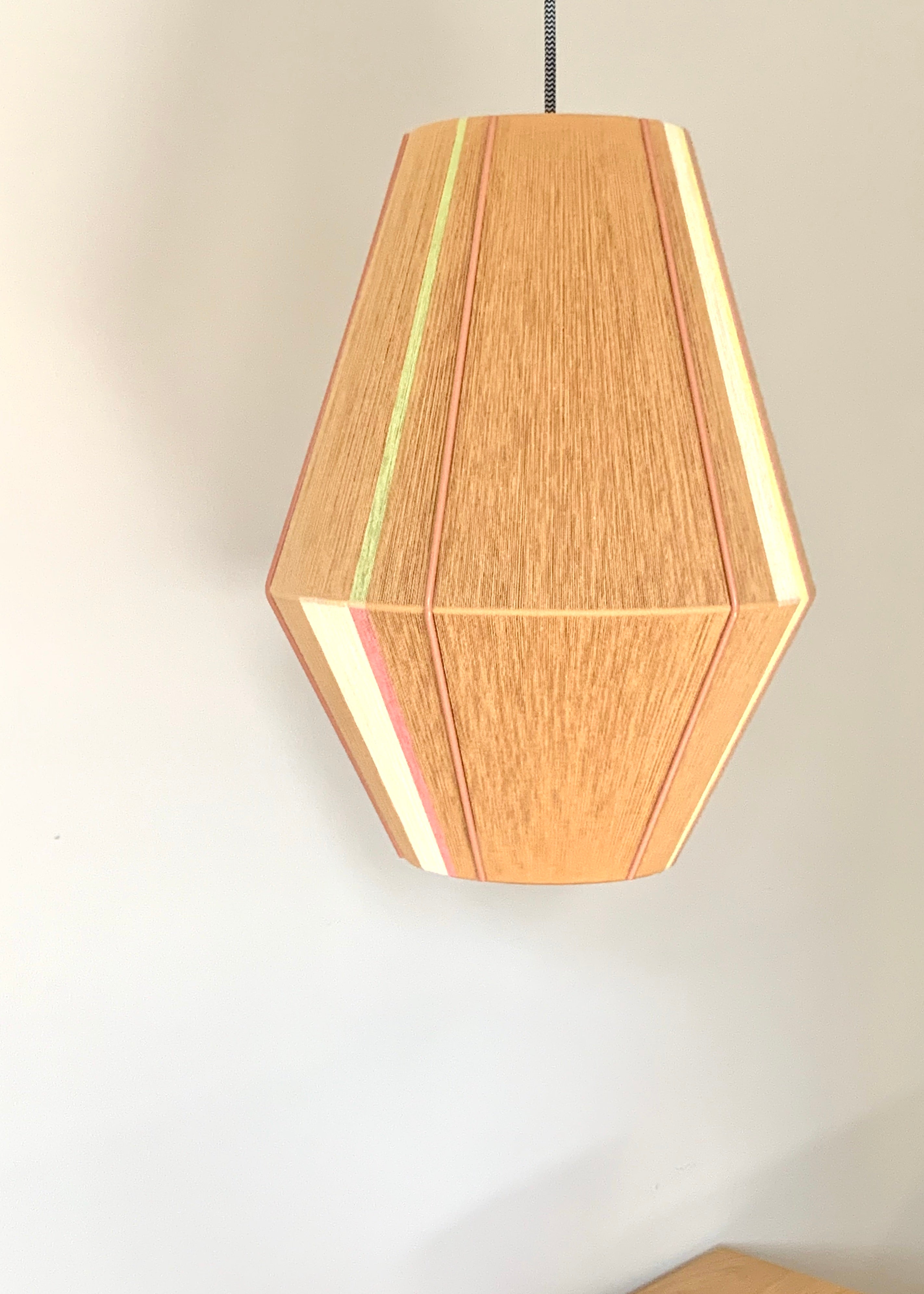 Lucy Baya pendant light handwoven in soft pink, lavender, mint and natural yarns by Skye Lightly
