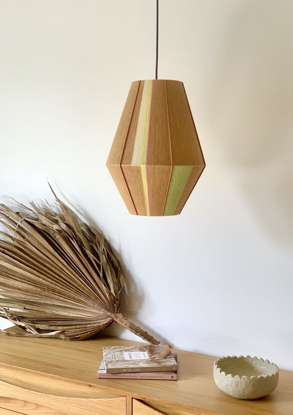 Lucy Baya pendant light handwoven in soft pink, lavender, mint and natural yarns by Skye Lightly

