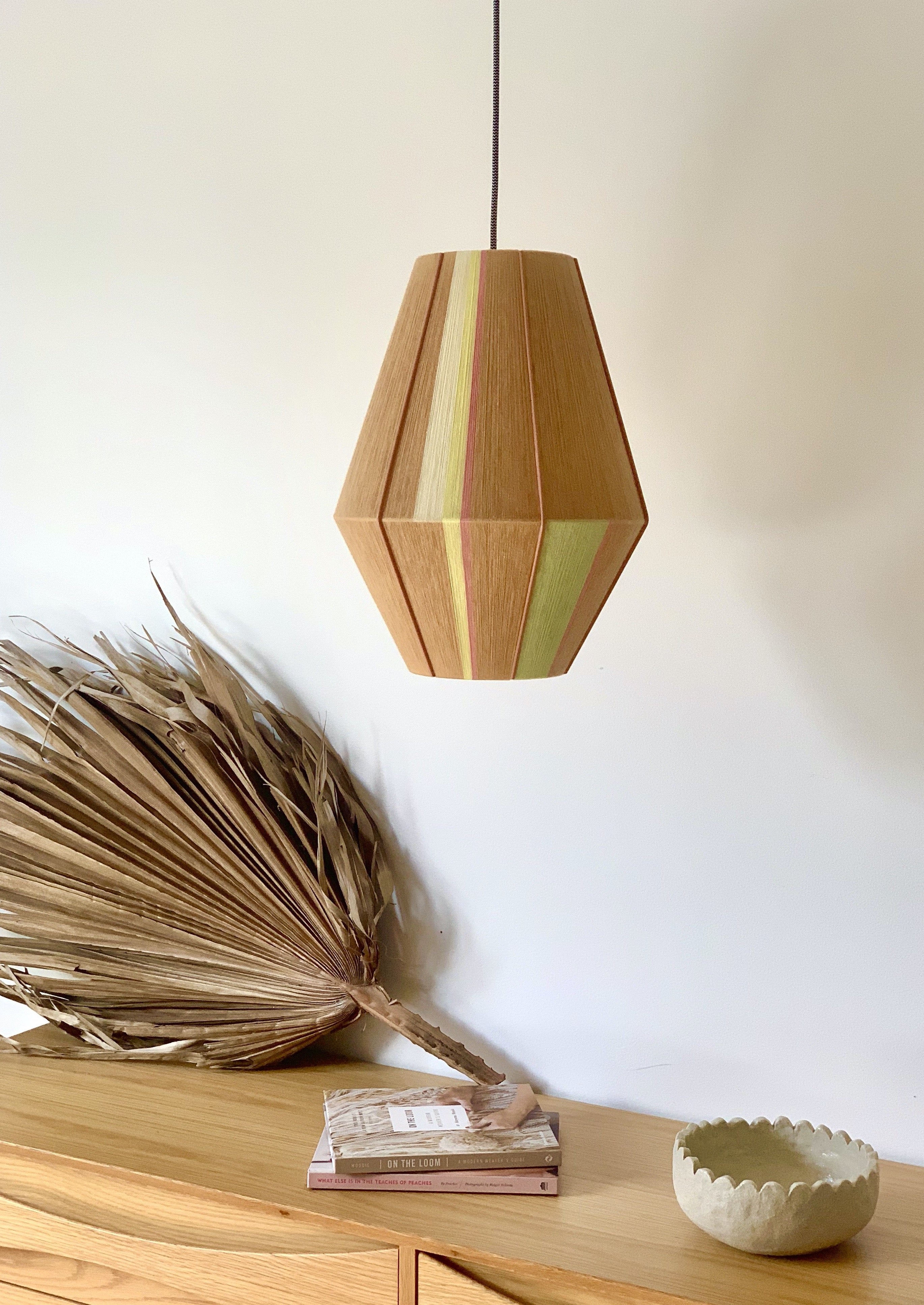 Lucy Baya pendant light handwoven in soft pink, lavender, mint and natural yarns by Skye Lightly
