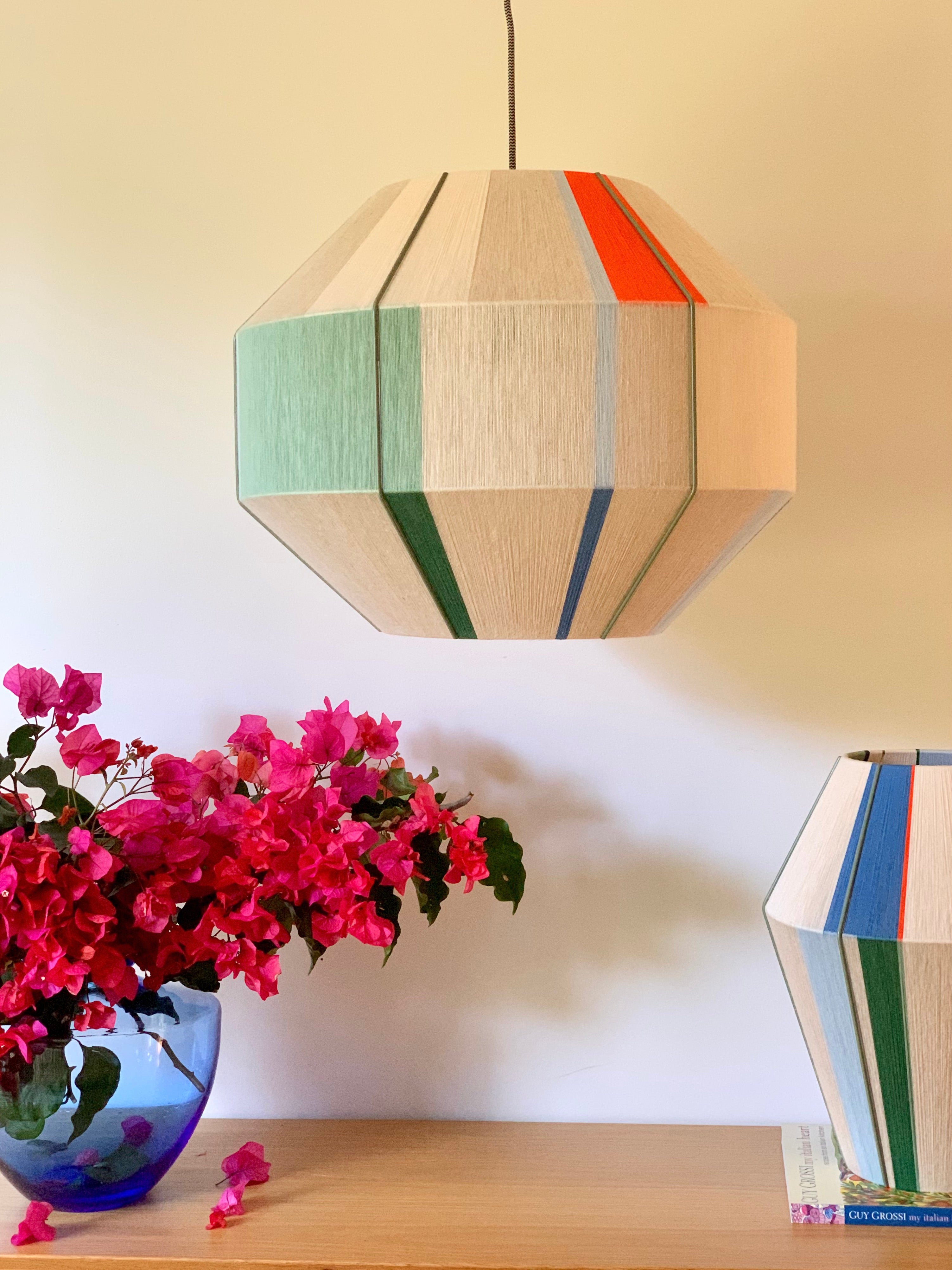 Mirkarla Hive pendant light handwoven in pink, raspberry, peach and natural yarns by Skye Lightly
