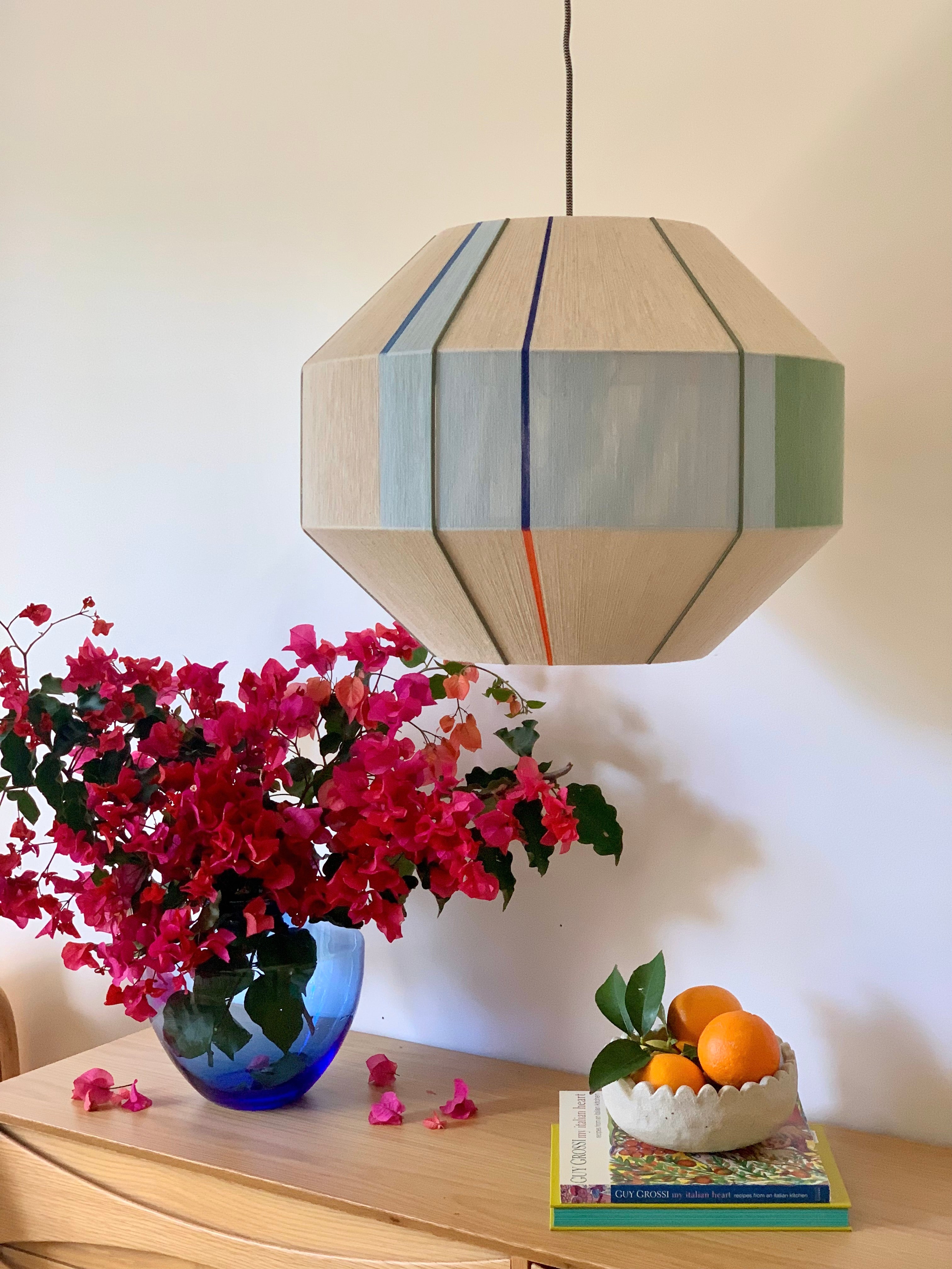 Mirkarla Hive pendant light handwoven in pink, raspberry, peach and natural yarns by Skye Lightly
