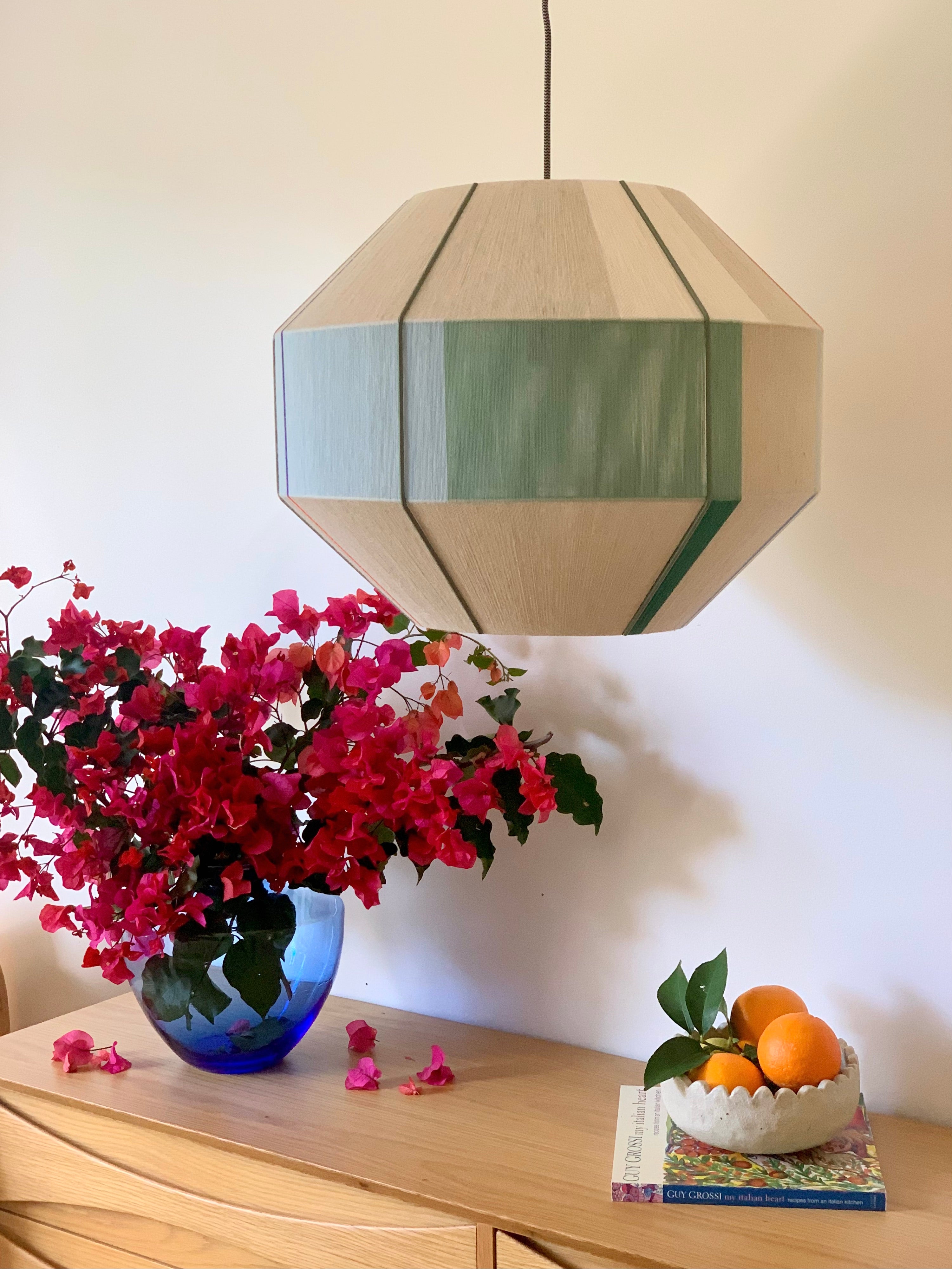 Mirkarla Hive pendant light handwoven in pink, raspberry, peach and natural yarns by Skye Lightly
