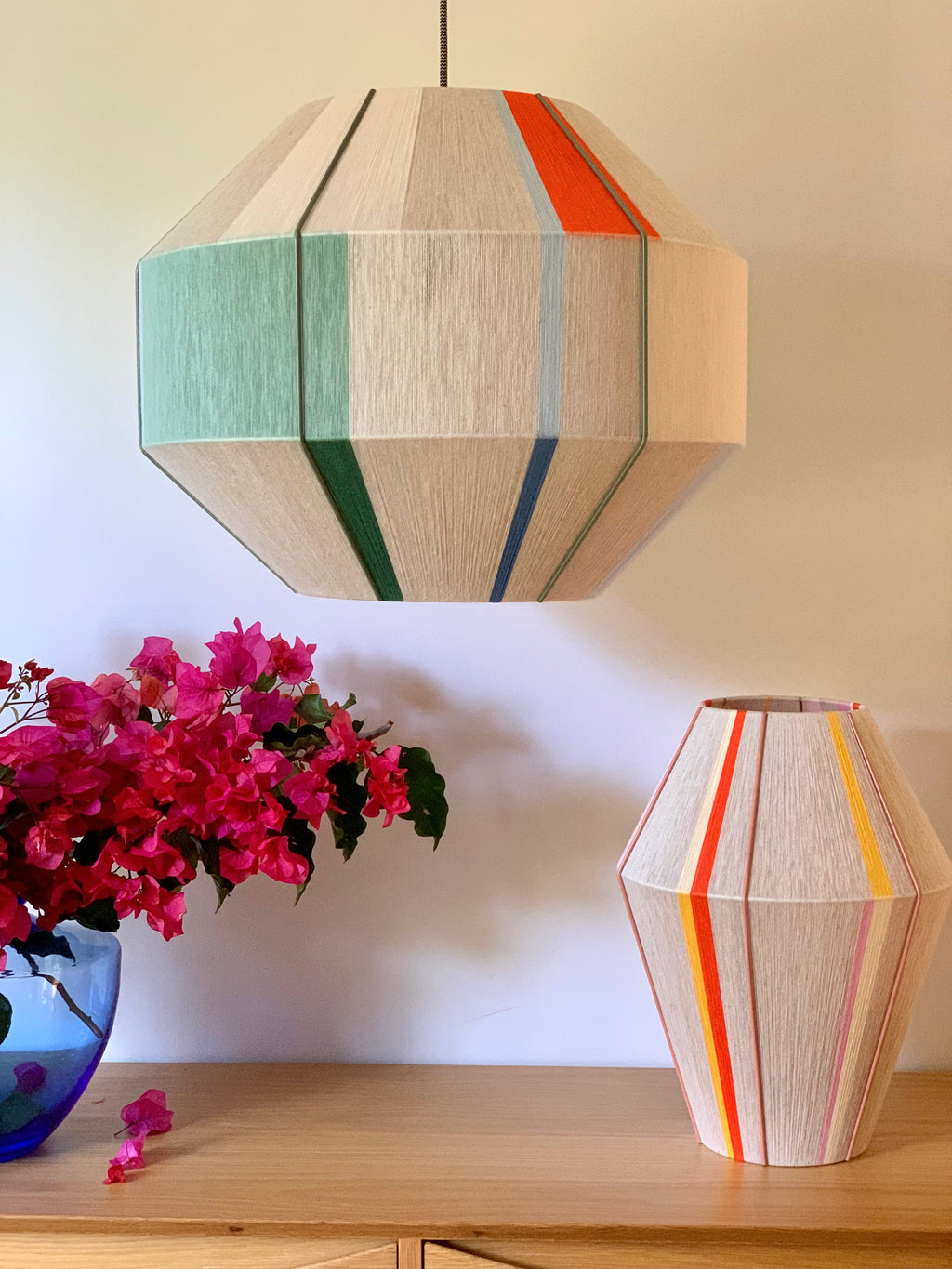 Mirkarla Hive pendant light handwoven in pink, raspberry, peach and natural yarns by Skye Lightly
