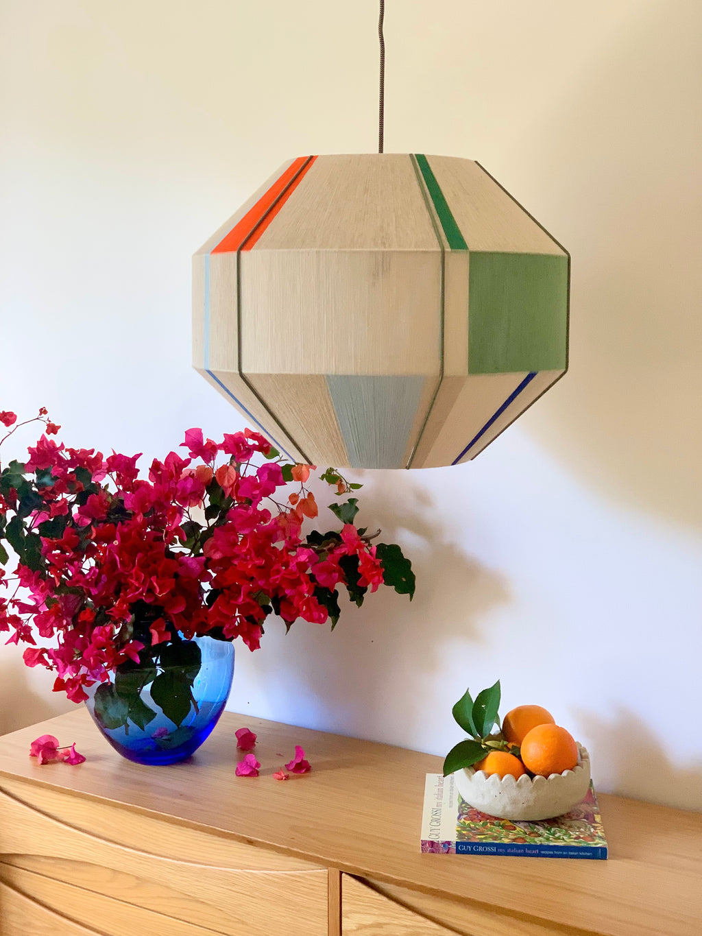 Mirkarla Hive pendant light handwoven in pink, raspberry, peach and natural yarns by Skye Lightly

