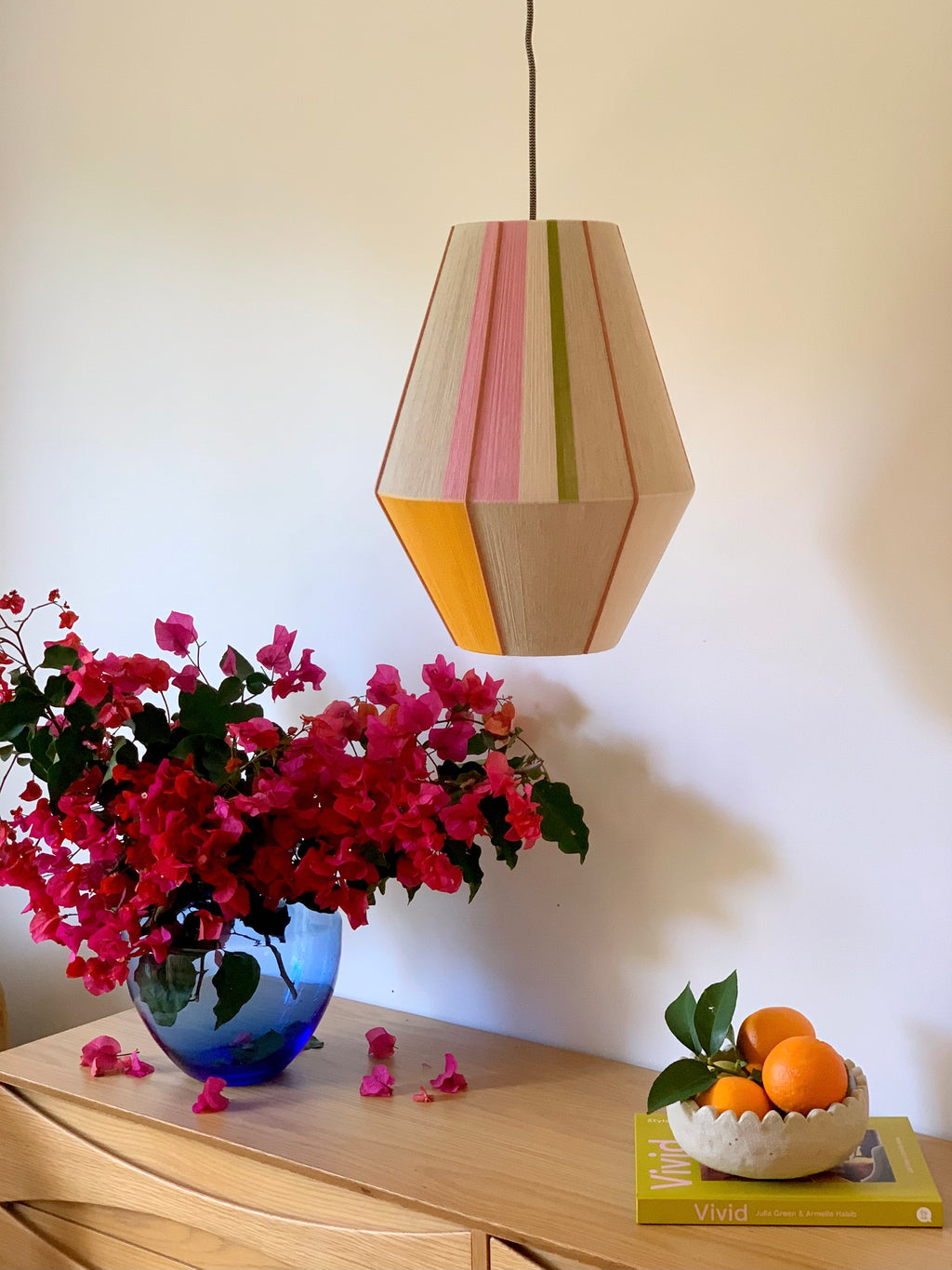Sofia Baya pendant light handwoven in blush, lavender, buttercup yellow, and natural yarns by Skye Lightly lifestyle image 5
