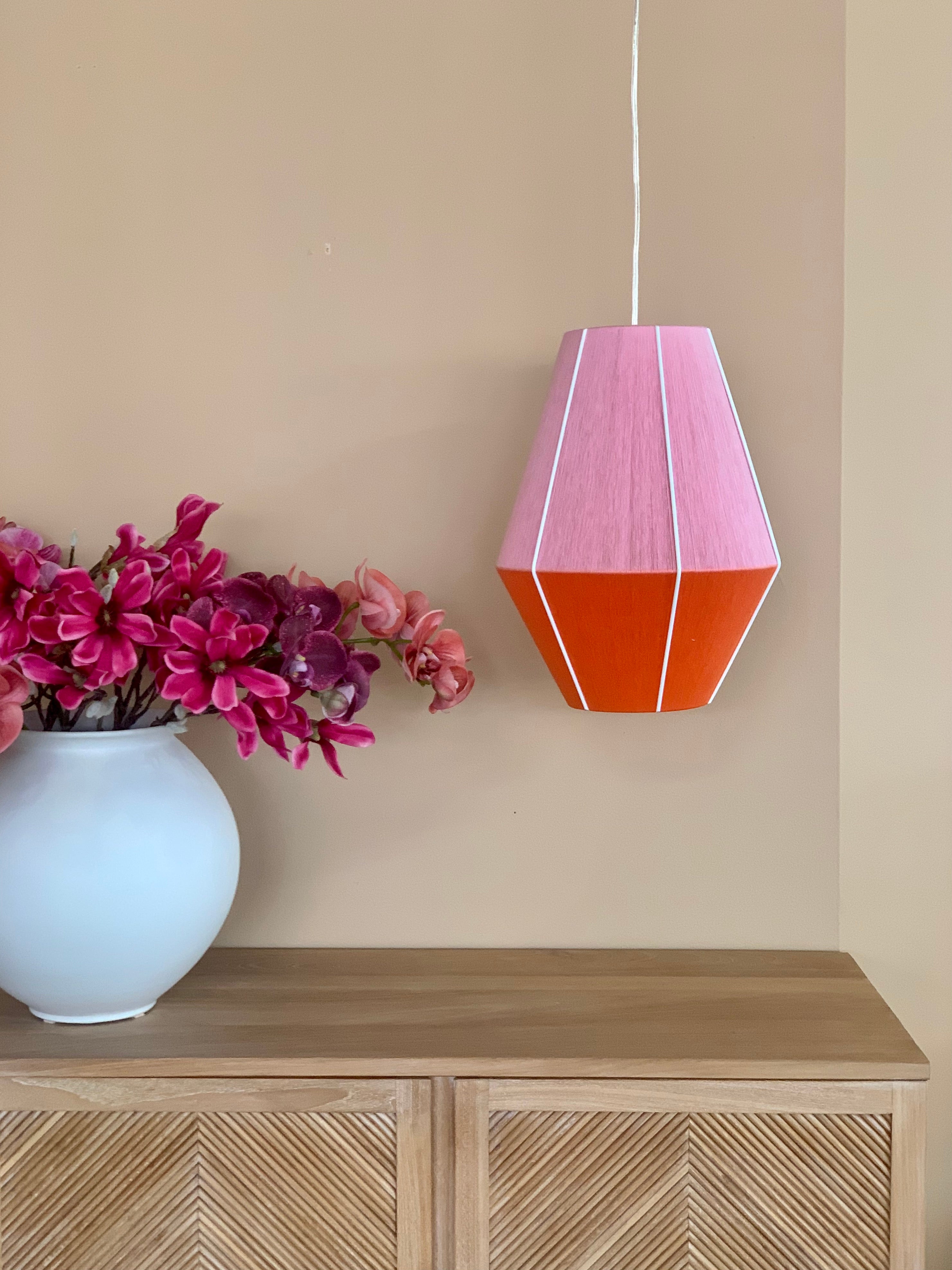 Taylor Baya pendant light handwoven in mustard, peach, lilac, and natural yarns by Skye Lightly 4
