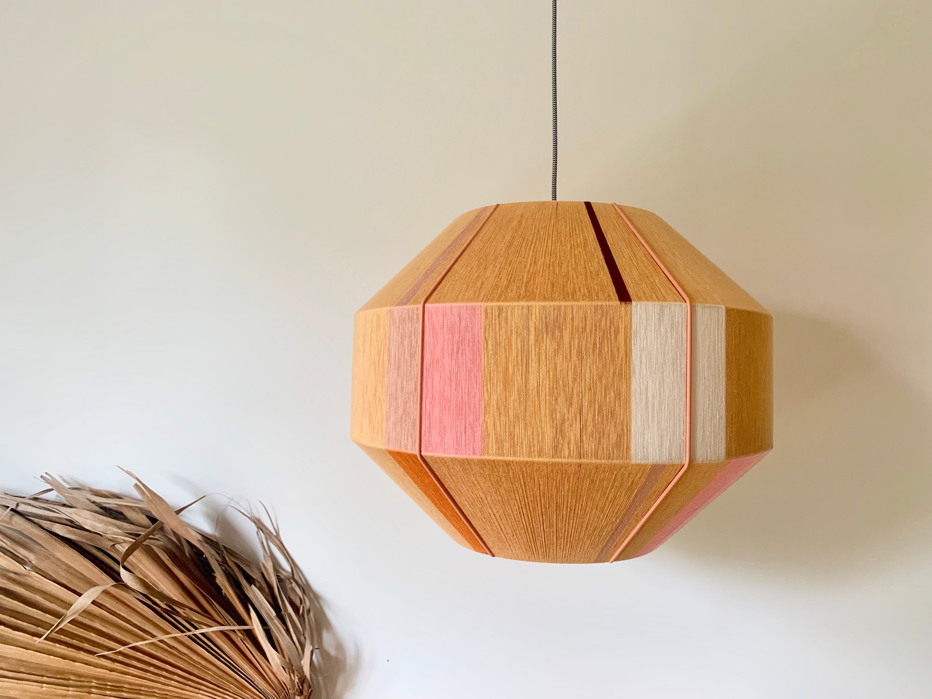Tommy Hive pendant light handwoven in blue, mustard, coral and natural yarns by Skye Lightly
