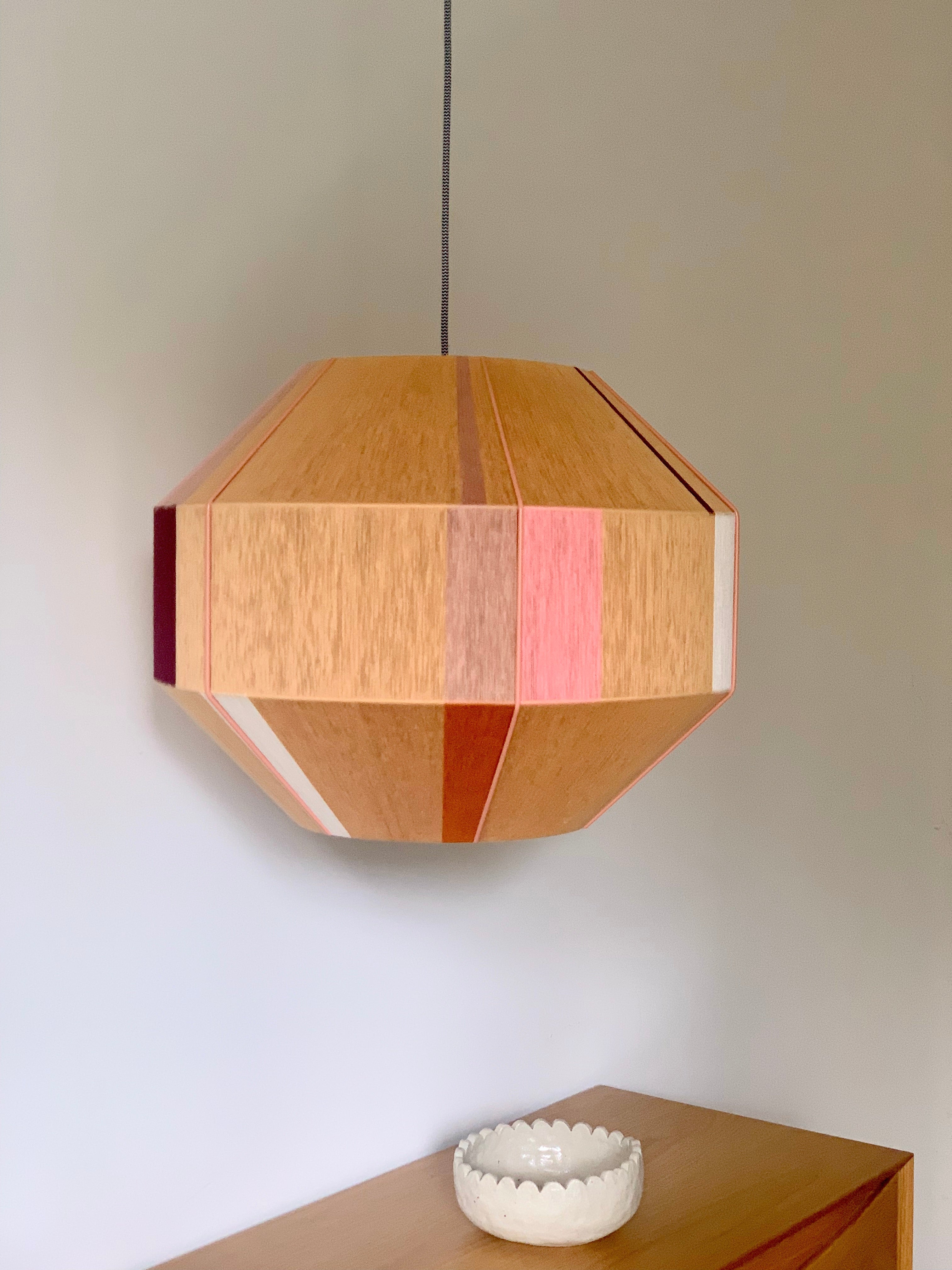 Tommy Hive pendant light handwoven in blue, mustard, coral and natural yarns by Skye Lightly
