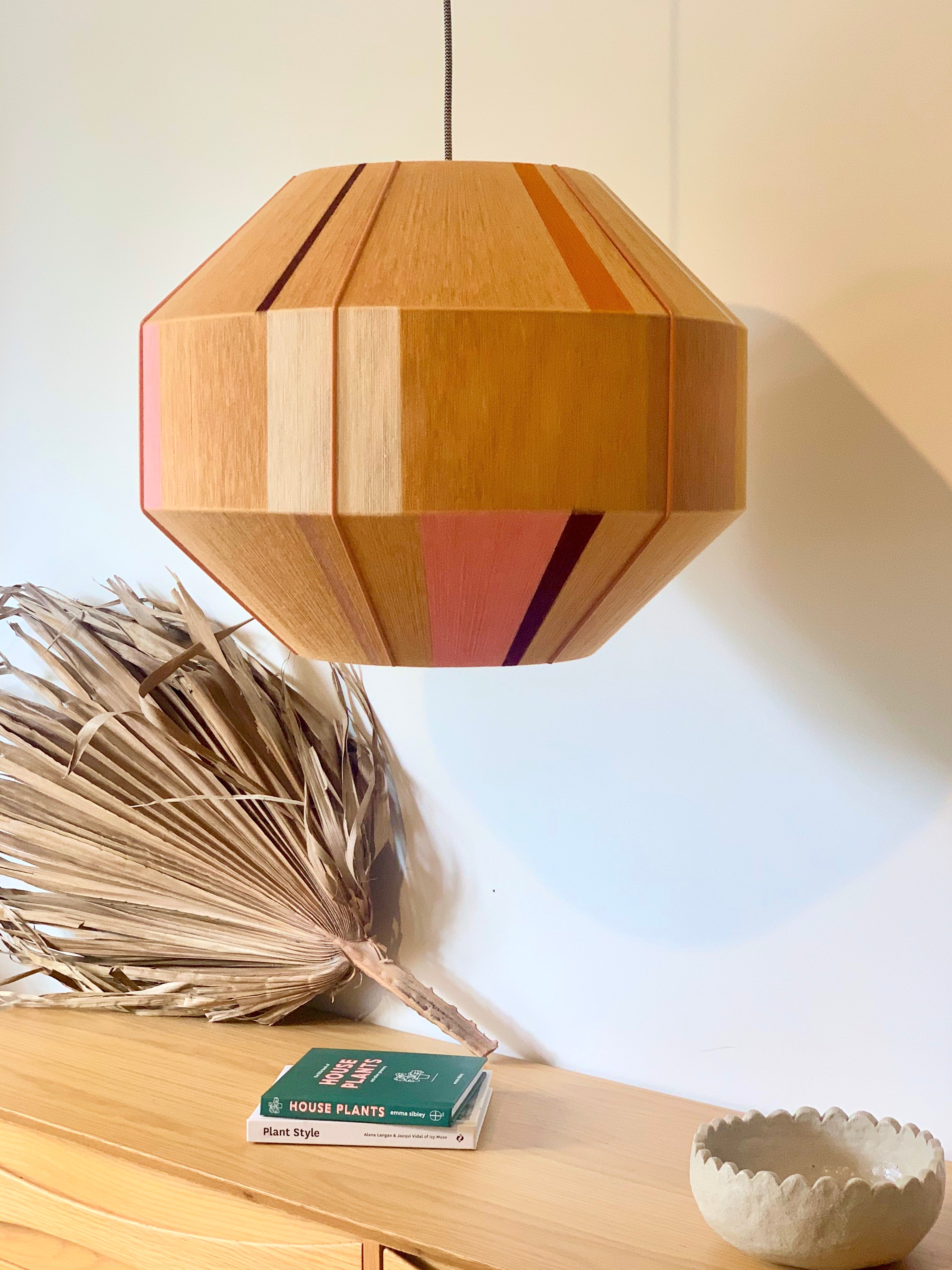 Tommy Hive pendant light handwoven in blue, mustard, coral and natural yarns by Skye Lightly
