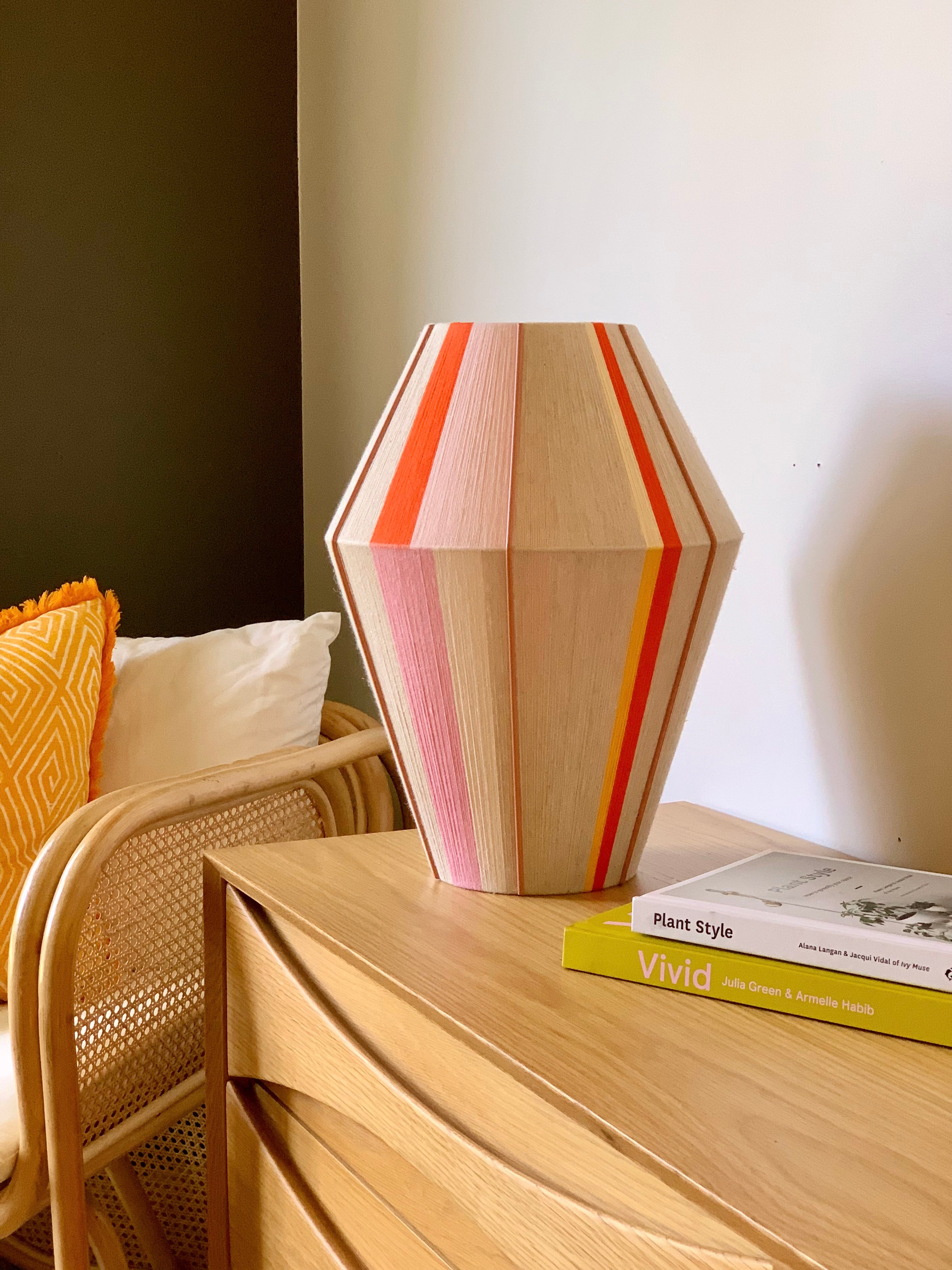 Valentina handwoven pendant light in coral, mustard, and eucalyptus yarns by Skye Lightly