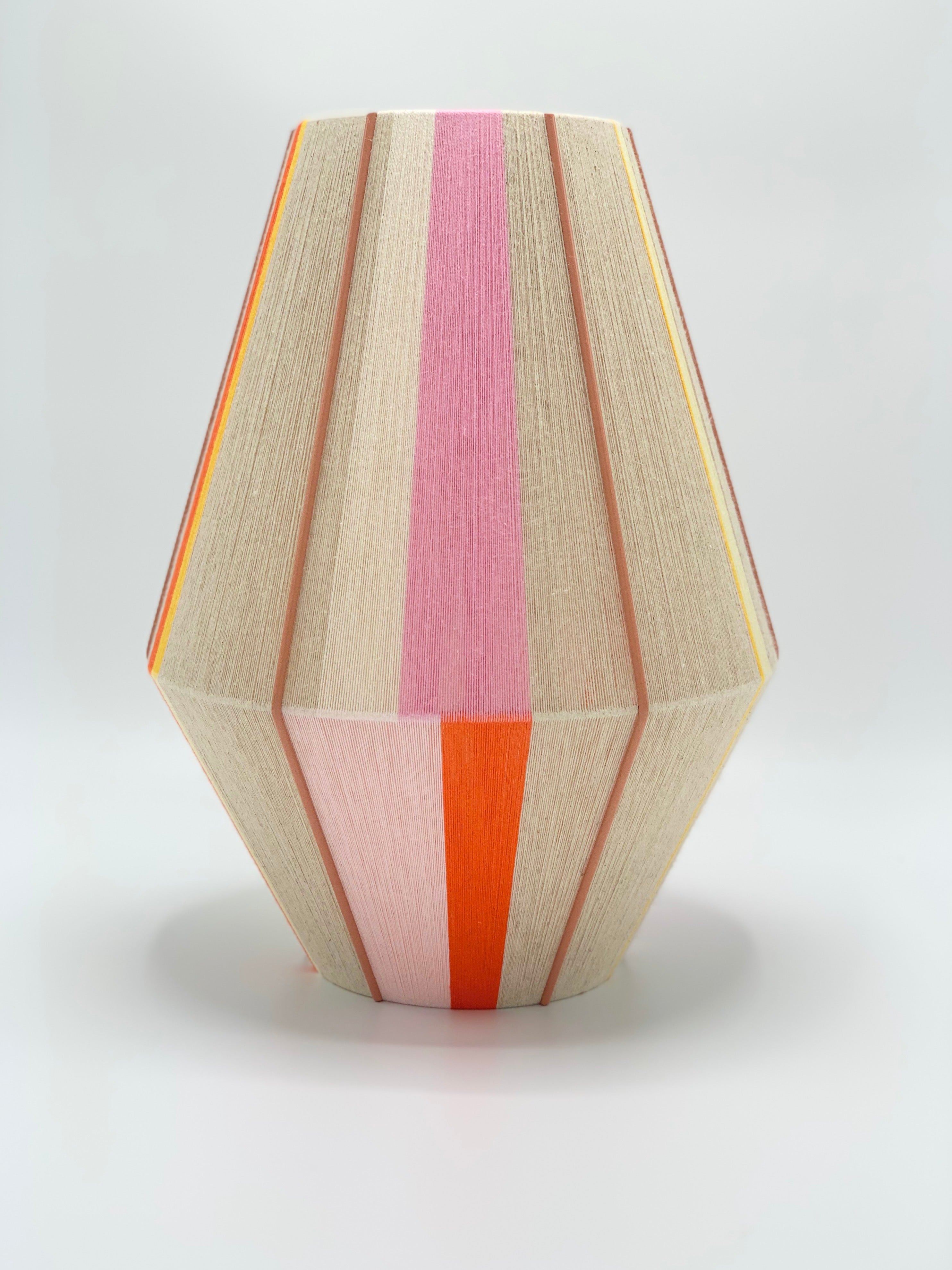 Valentina handwoven pendant light in coral, mustard, and eucalyptus yarns by Skye Lightly