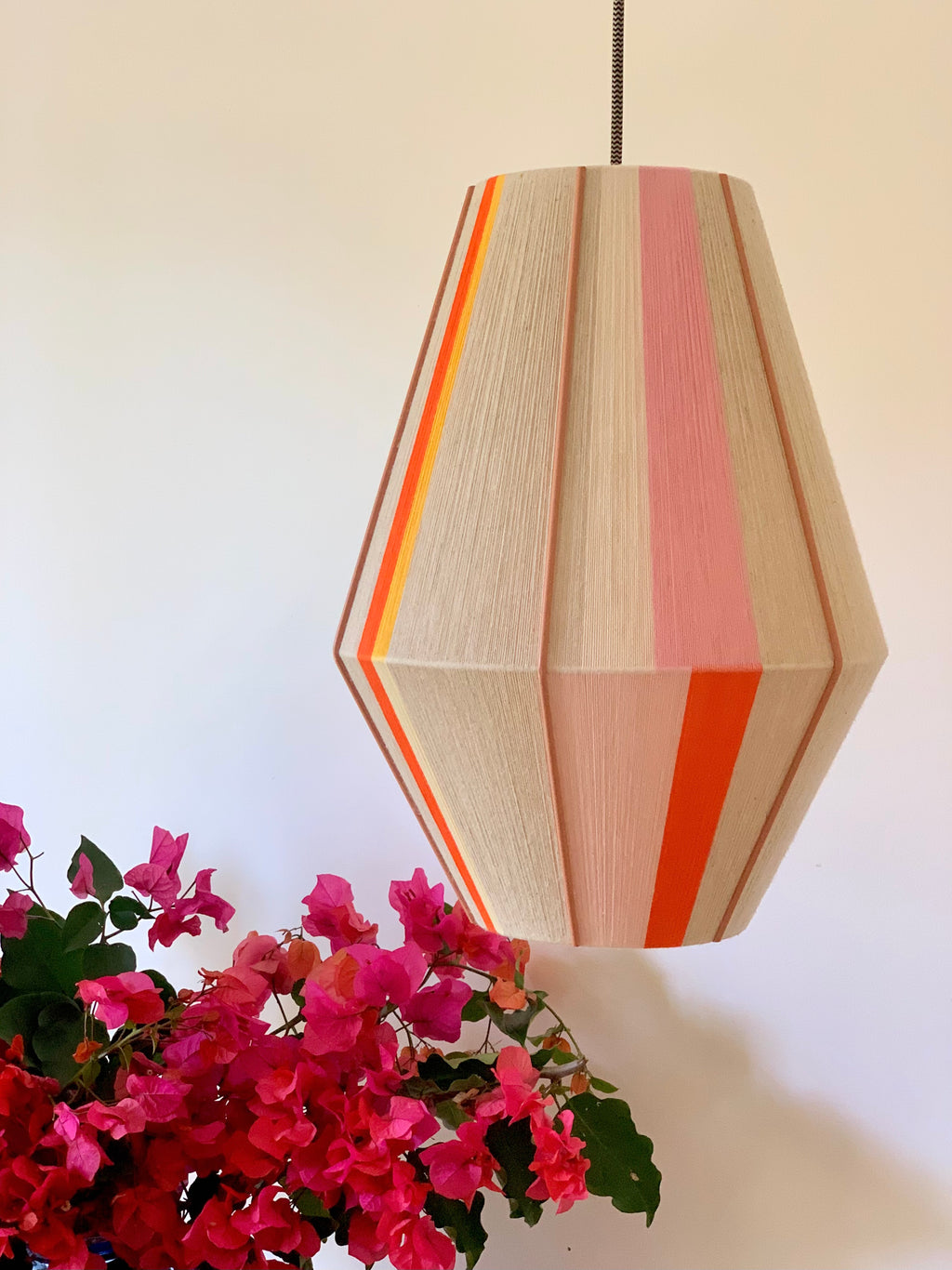 Valentina handwoven pendant light in coral, mustard, and eucalyptus yarns by Skye Lightly