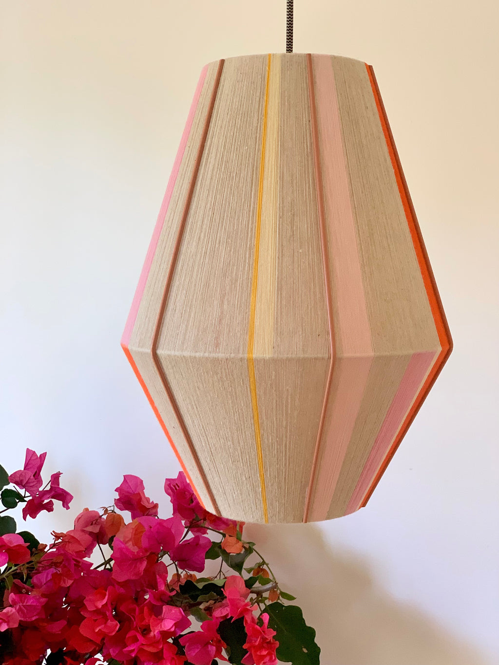 Valentina handwoven pendant light in coral, mustard, and eucalyptus yarns by Skye Lightly